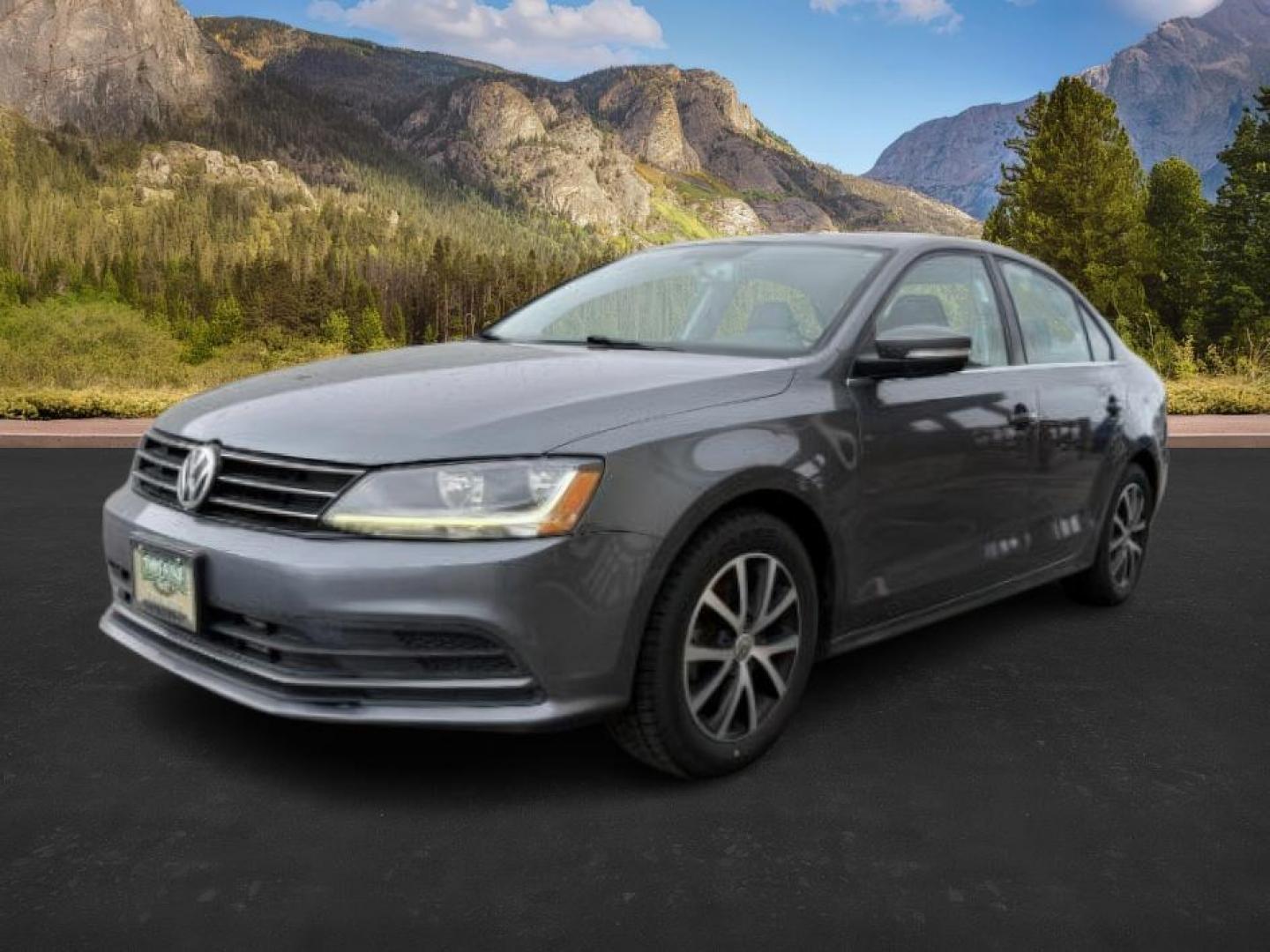 2017 GRAY /LEATHER VW JETTA SE (3VWDB7AJ4HM) with an 4CYL engine, AUTOMATIC transmission, located at 1235 N Woodruff Ave., Idaho Falls, 83401, (208) 523-1053, 43.507172, -112.000488 - At Timberline Auto, finding a great deal on your next vehicle is always easy! Our experienced sales staff's goal is to help find you the right vehicle at the right price! Our knowledgeable finance department has options for almost any credit score. We offer extended service contract options to prote - Photo#0