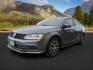 2017 GRAY /LEATHER VW JETTA SE (3VWDB7AJ4HM) with an 4CYL engine, AUTOMATIC transmission, located at 1235 N Woodruff Ave., Idaho Falls, 83401, (208) 523-1053, 43.507172, -112.000488 - At Timberline Auto, finding a great deal on your next vehicle is always easy! Our experienced sales staff's goal is to help find you the right vehicle at the right price! Our knowledgeable finance department has options for almost any credit score. We offer extended service contract options to prote - Photo#0