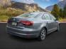2017 GRAY /LEATHER VW JETTA SE (3VWDB7AJ4HM) with an 4CYL engine, AUTOMATIC transmission, located at 1235 N Woodruff Ave., Idaho Falls, 83401, (208) 523-1053, 43.507172, -112.000488 - At Timberline Auto, finding a great deal on your next vehicle is always easy! Our experienced sales staff's goal is to help find you the right vehicle at the right price! Our knowledgeable finance department has options for almost any credit score. We offer extended service contract options to prote - Photo#3