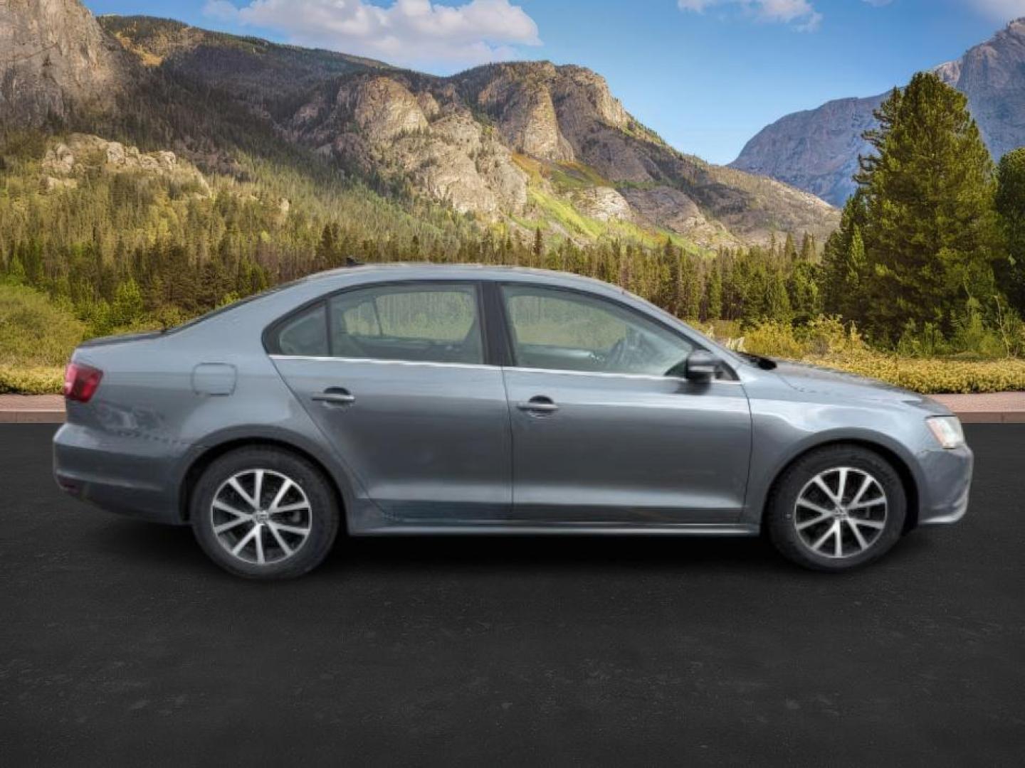 2017 GRAY /LEATHER VW JETTA SE (3VWDB7AJ4HM) with an 4CYL engine, AUTOMATIC transmission, located at 1235 N Woodruff Ave., Idaho Falls, 83401, (208) 523-1053, 43.507172, -112.000488 - At Timberline Auto, finding a great deal on your next vehicle is always easy! Our experienced sales staff's goal is to help find you the right vehicle at the right price! Our knowledgeable finance department has options for almost any credit score. We offer extended service contract options to prote - Photo#4