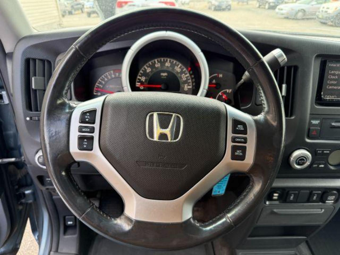 2008 Steel Blue Metallic /Gray Honda Ridgeline RTL (2HJYK16558H) with an 3.5L V-6 variable valve control engine, AUTOMATIC transmission, located at 1235 N Woodruff Ave., Idaho Falls, 83401, (208) 523-1053, 43.507172, -112.000488 - At Timberline Auto, finding a great deal on your next vehicle is always easy! Our experienced sales staff's goal is to help find you the right vehicle at the right price! Our knowledgeable finance department has options for almost any credit score. We offer extended service contract options to prote - Photo#11