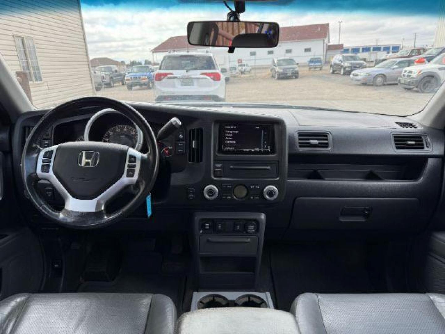 2008 Steel Blue Metallic /Gray Honda Ridgeline RTL (2HJYK16558H) with an 3.5L V-6 variable valve control engine, AUTOMATIC transmission, located at 1235 N Woodruff Ave., Idaho Falls, 83401, (208) 523-1053, 43.507172, -112.000488 - At Timberline Auto, finding a great deal on your next vehicle is always easy! Our experienced sales staff's goal is to help find you the right vehicle at the right price! Our knowledgeable finance department has options for almost any credit score. We offer extended service contract options to prote - Photo#13