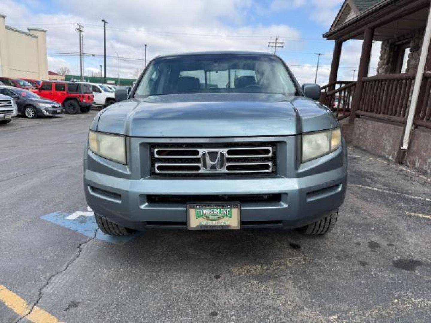 2008 Steel Blue Metallic /Gray Honda Ridgeline RTL (2HJYK16558H) with an 3.5L V-6 variable valve control engine, AUTOMATIC transmission, located at 1235 N Woodruff Ave., Idaho Falls, 83401, (208) 523-1053, 43.507172, -112.000488 - At Timberline Auto, finding a great deal on your next vehicle is always easy! Our experienced sales staff's goal is to help find you the right vehicle at the right price! Our knowledgeable finance department has options for almost any credit score. We offer extended service contract options to prote - Photo#6