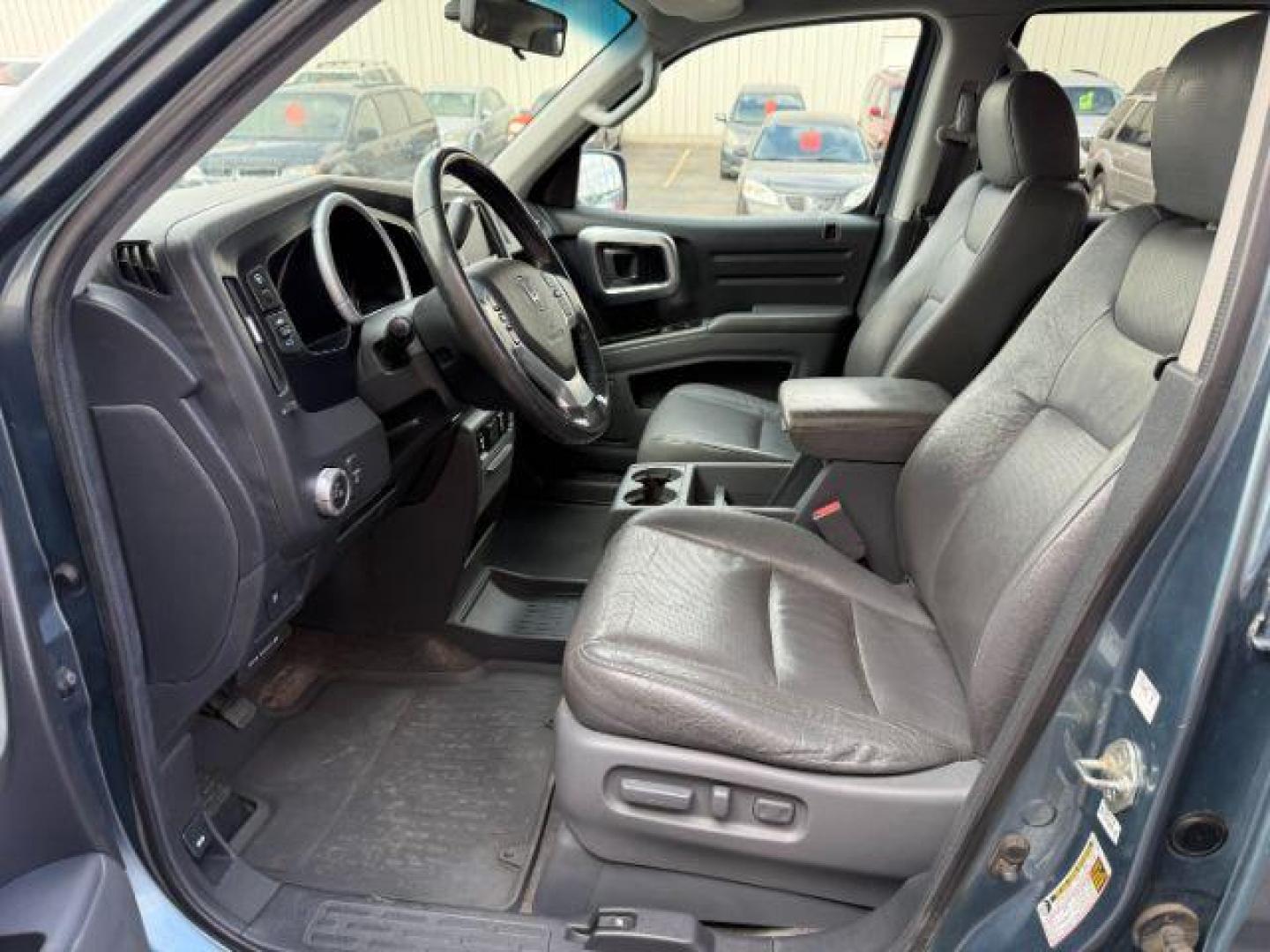 2008 Steel Blue Metallic /Gray Honda Ridgeline RTL (2HJYK16558H) with an 3.5L V-6 variable valve control engine, AUTOMATIC transmission, located at 1235 N Woodruff Ave., Idaho Falls, 83401, (208) 523-1053, 43.507172, -112.000488 - At Timberline Auto, finding a great deal on your next vehicle is always easy! Our experienced sales staff's goal is to help find you the right vehicle at the right price! Our knowledgeable finance department has options for almost any credit score. We offer extended service contract options to prote - Photo#8
