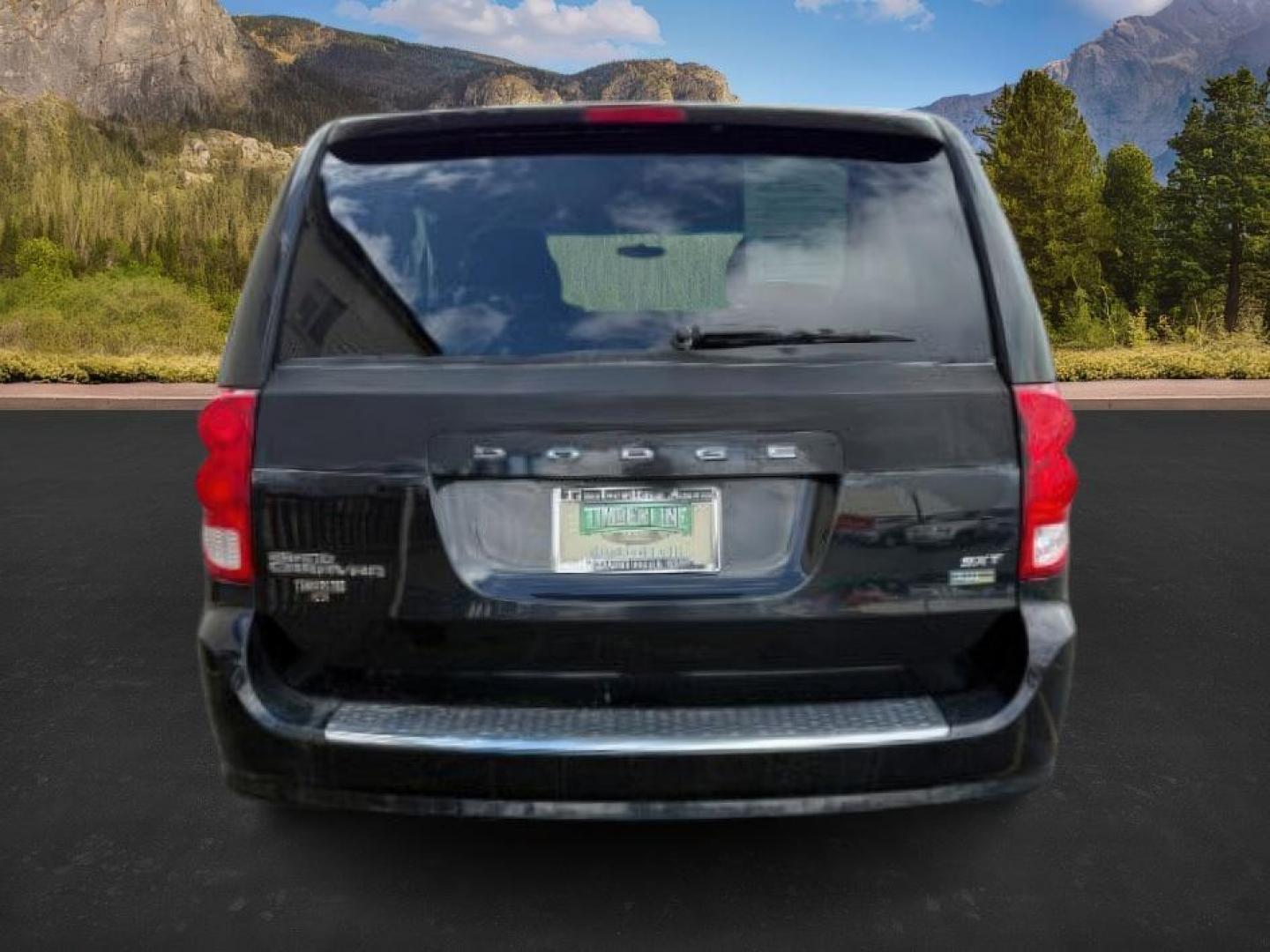 2014 GRAY /Black Dodge Grand Caravan SXT (2C4RDGCG5ER) with an 3.6L V-6 DOHC engine, AUTOMATIC transmission, located at 1235 N Woodruff Ave., Idaho Falls, 83401, (208) 523-1053, 43.507172, -112.000488 - At Timberline Auto, finding a great deal on your next vehicle is always easy! Our experienced sales staff's goal is to help find you the right vehicle at the right price! Our knowledgeable finance department has options for almost any credit score. We offer extended service contract options to prote - Photo#2