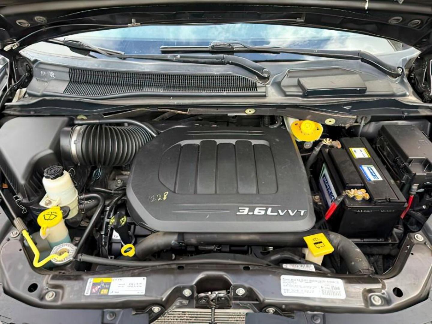 2014 GRAY /Black Dodge Grand Caravan SXT (2C4RDGCG5ER) with an 3.6L V-6 DOHC engine, AUTOMATIC transmission, located at 1235 N Woodruff Ave., Idaho Falls, 83401, (208) 523-1053, 43.507172, -112.000488 - At Timberline Auto, finding a great deal on your next vehicle is always easy! Our experienced sales staff's goal is to help find you the right vehicle at the right price! Our knowledgeable finance department has options for almost any credit score. We offer extended service contract options to prote - Photo#18