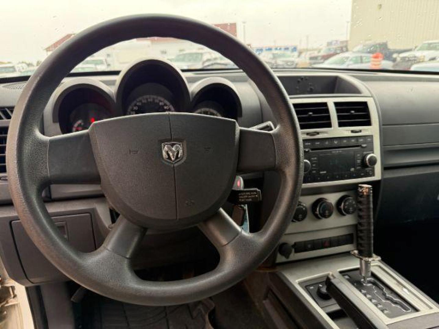 2008 Stone White Clearcoat /Dark Slate Grey Dodge Nitro SE/SXT (1D8GU28K58W) with an Magnum 3.7L V-6 regular unleaded engine, AUTOMATIC transmission, located at 1235 N Woodruff Ave., Idaho Falls, 83401, (208) 523-1053, 43.507172, -112.000488 - At Timberline Auto, finding a great deal on your next vehicle is always easy! Our experienced sales staff's goal is to help find you the right vehicle at the right price! Our knowledgeable finance department has options for almost any credit score. We offer extended service contract options to prote - Photo#11