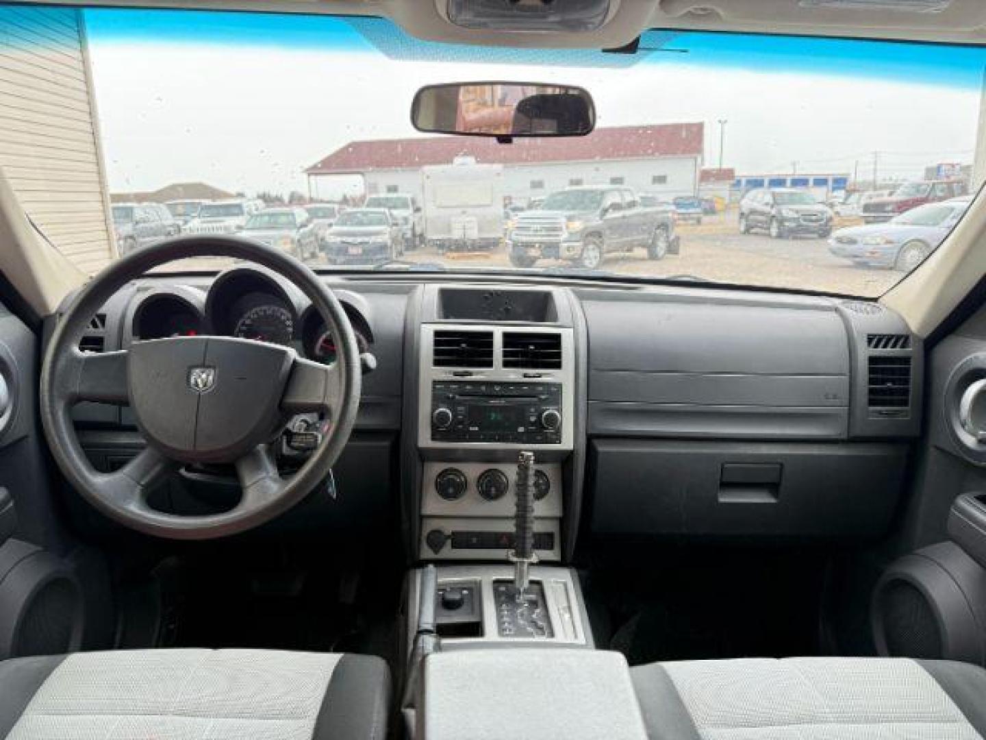 2008 Stone White Clearcoat /Dark Slate Grey Dodge Nitro SE/SXT (1D8GU28K58W) with an Magnum 3.7L V-6 regular unleaded engine, AUTOMATIC transmission, located at 1235 N Woodruff Ave., Idaho Falls, 83401, (208) 523-1053, 43.507172, -112.000488 - At Timberline Auto, finding a great deal on your next vehicle is always easy! Our experienced sales staff's goal is to help find you the right vehicle at the right price! Our knowledgeable finance department has options for almost any credit score. We offer extended service contract options to prote - Photo#15