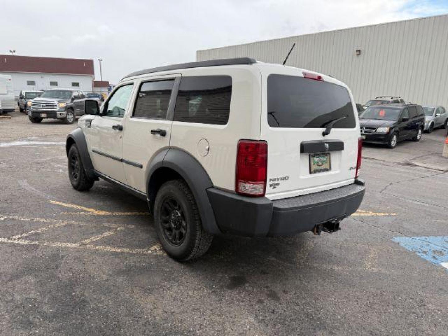 2008 Stone White Clearcoat /Dark Slate Grey Dodge Nitro SE/SXT (1D8GU28K58W) with an Magnum 3.7L V-6 regular unleaded engine, AUTOMATIC transmission, located at 1235 N Woodruff Ave., Idaho Falls, 83401, (208) 523-1053, 43.507172, -112.000488 - At Timberline Auto, finding a great deal on your next vehicle is always easy! Our experienced sales staff's goal is to help find you the right vehicle at the right price! Our knowledgeable finance department has options for almost any credit score. We offer extended service contract options to prote - Photo#1