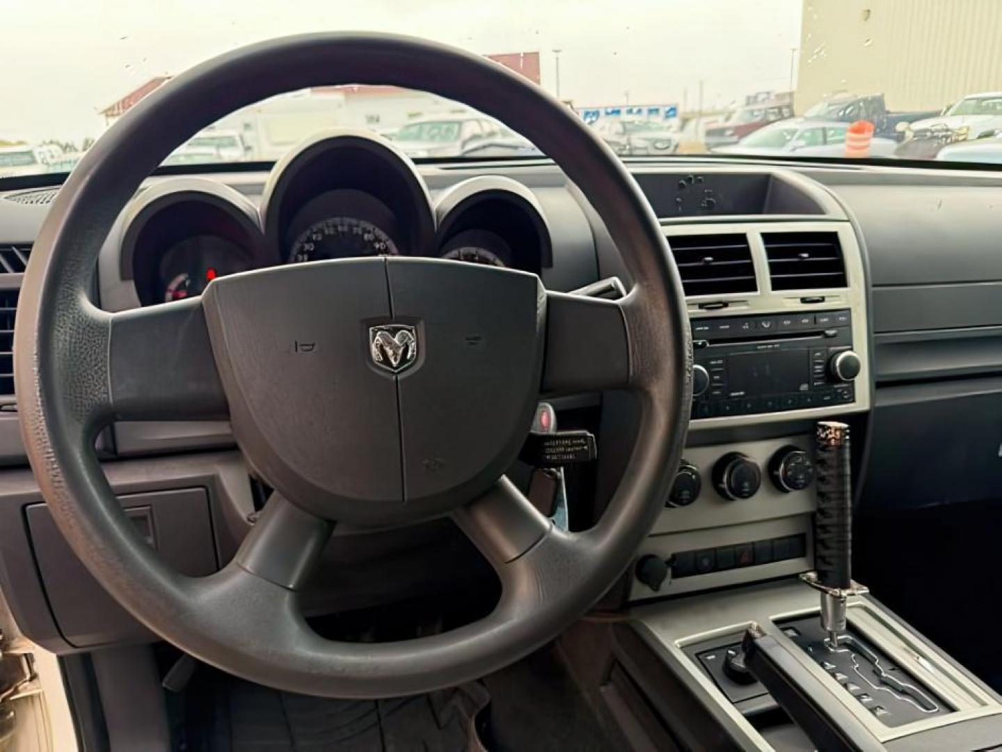 2008 Stone White Clearcoat /Dark Slate Grey Dodge Nitro SE/SXT (1D8GU28K58W) with an Magnum 3.7L V-6 regular unleaded engine, AUTOMATIC transmission, located at 1235 N Woodruff Ave., Idaho Falls, 83401, (208) 523-1053, 43.507172, -112.000488 - At Timberline Auto, finding a great deal on your next vehicle is always easy! Our experienced sales staff's goal is to help find you the right vehicle at the right price! Our knowledgeable finance department has options for almost any credit score. We offer extended service contract options to prote - Photo#11