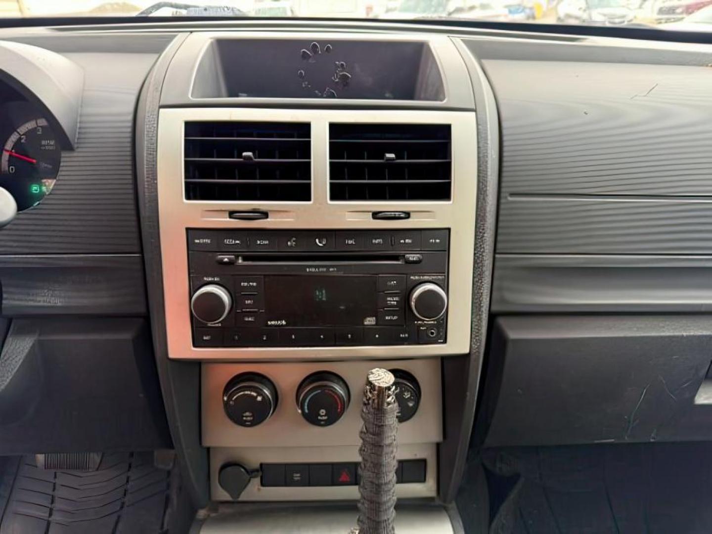 2008 Stone White Clearcoat /Dark Slate Grey Dodge Nitro SE/SXT (1D8GU28K58W) with an Magnum 3.7L V-6 regular unleaded engine, AUTOMATIC transmission, located at 1235 N Woodruff Ave., Idaho Falls, 83401, (208) 523-1053, 43.507172, -112.000488 - At Timberline Auto, finding a great deal on your next vehicle is always easy! Our experienced sales staff's goal is to help find you the right vehicle at the right price! Our knowledgeable finance department has options for almost any credit score. We offer extended service contract options to prote - Photo#12