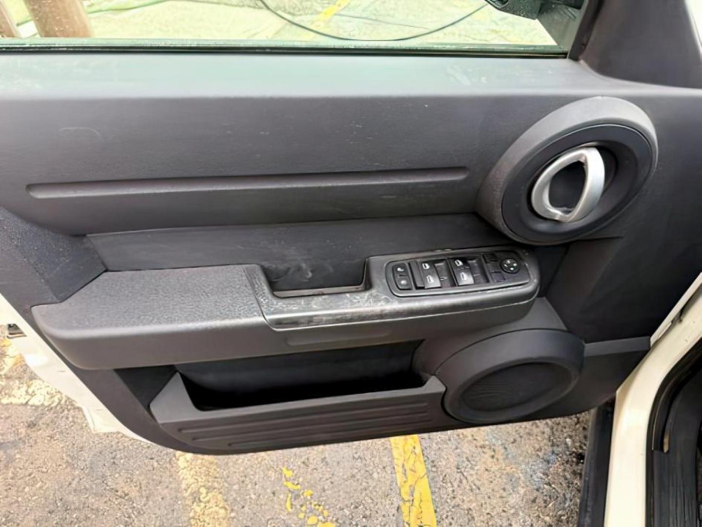 2008 Stone White Clearcoat /Dark Slate Grey Dodge Nitro SE/SXT (1D8GU28K58W) with an Magnum 3.7L V-6 regular unleaded engine, AUTOMATIC transmission, located at 1235 N Woodruff Ave., Idaho Falls, 83401, (208) 523-1053, 43.507172, -112.000488 - At Timberline Auto, finding a great deal on your next vehicle is always easy! Our experienced sales staff's goal is to help find you the right vehicle at the right price! Our knowledgeable finance department has options for almost any credit score. We offer extended service contract options to prote - Photo#14