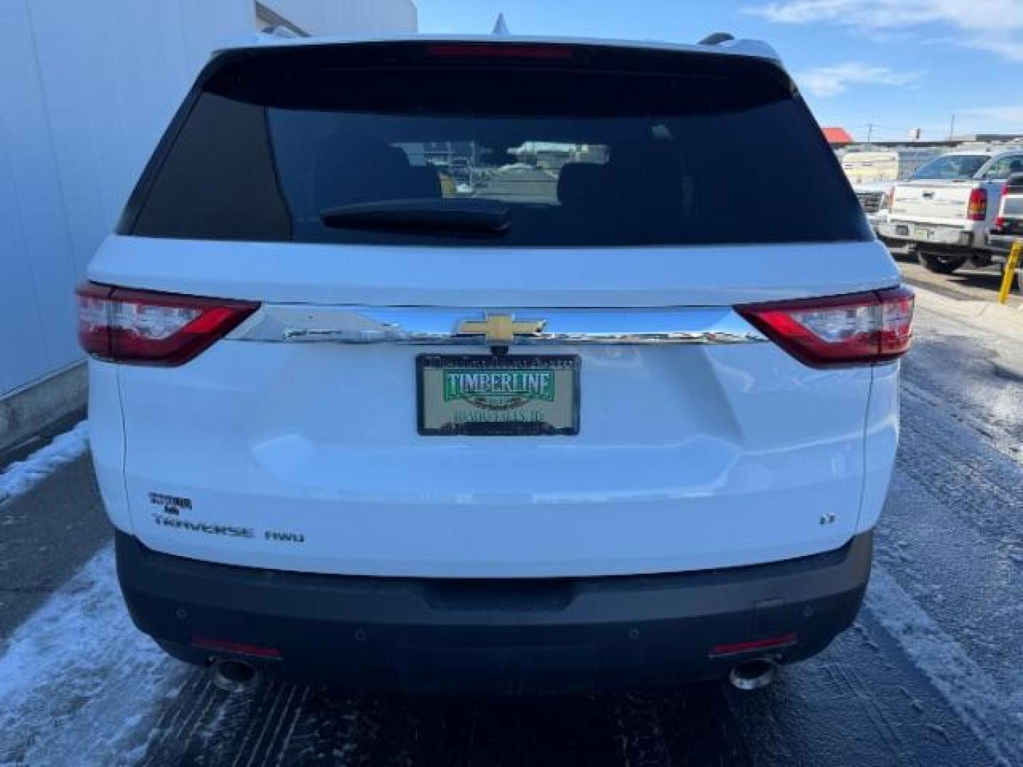 2021 Summit White /Jet Black Chevrolet Traverse AWD LT Cloth (1GNEVGKW1MJ) with an 3.6L V-6 gasoline direct injection engine, AUTOMATIC transmission, located at 1235 N Woodruff Ave., Idaho Falls, 83401, (208) 523-1053, 43.507172, -112.000488 - Photo#2