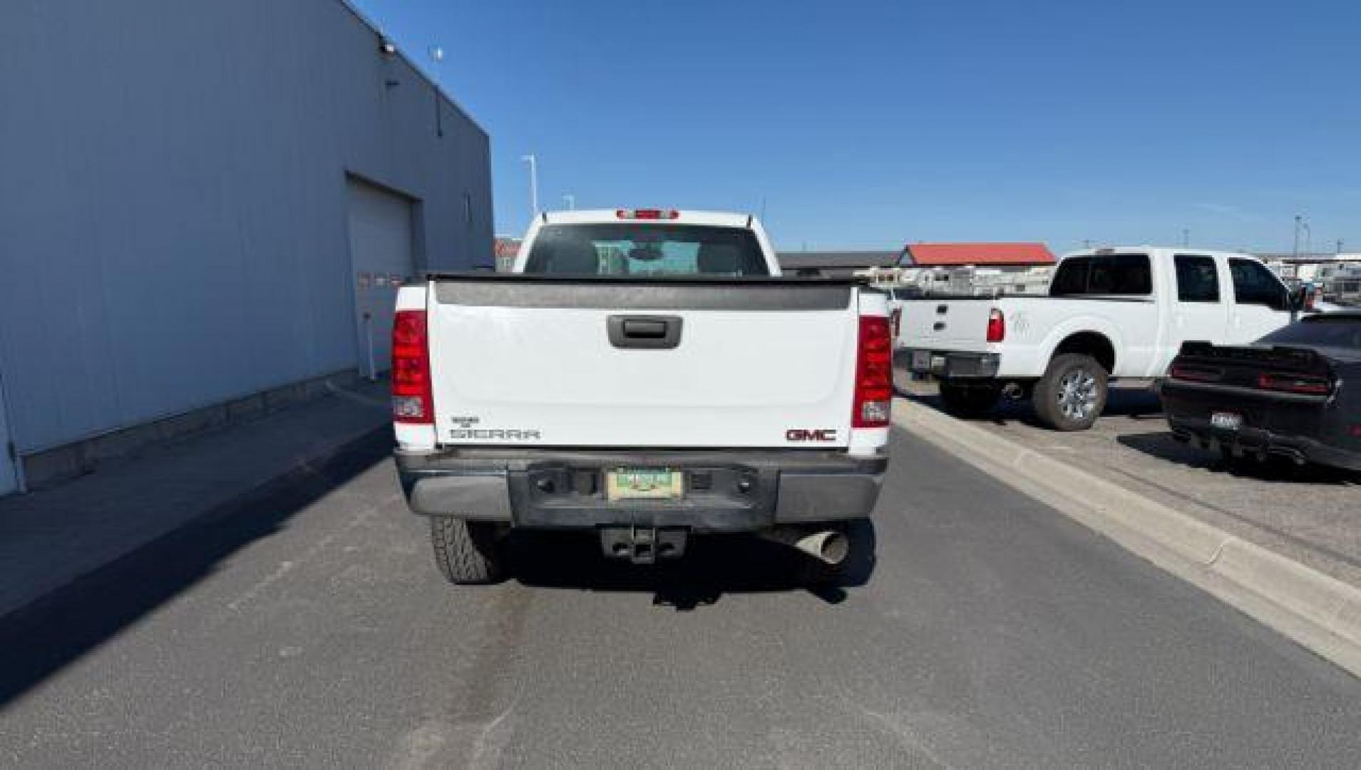2013 Summit White /Dark Titanium GMC Sierra 2500HD SLE (1GT02ZC87DZ) with an Duramax 6.6L V-8 diesel direct injection engine, AUTOMATIC transmission, located at 1235 N Woodruff Ave., Idaho Falls, 83401, (208) 523-1053, 43.507172, -112.000488 - At Timberline Auto, finding a great deal on your next vehicle is always easy! Our experienced sales staff's goal is to help find you the right vehicle at the right price! Our knowledgeable finance department has options for almost any credit score. We offer extended service contract options to prote - Photo#2