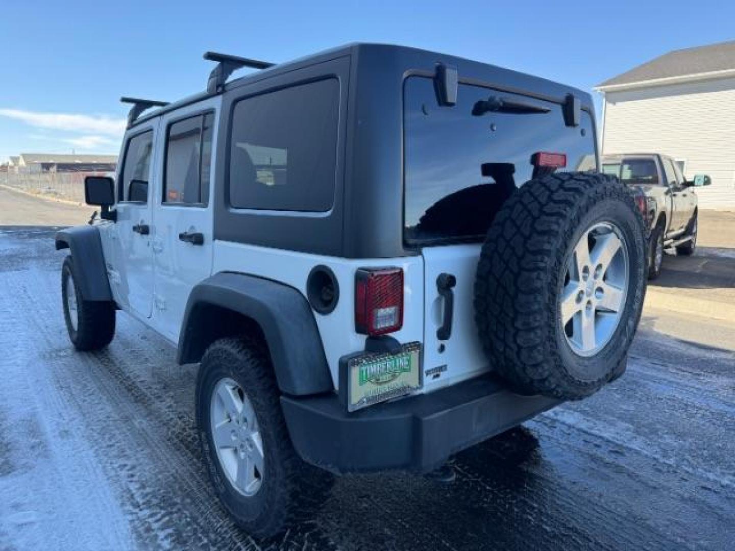 2015 WHITE /BLACK JEEP WRANGLER UNLIMITED SPORT (1C4BJWDG2FL) with an V-6 engine, AUTO transmission, located at 1235 N Woodruff Ave., Idaho Falls, 83401, (208) 523-1053, 43.507172, -112.000488 - Photo#1