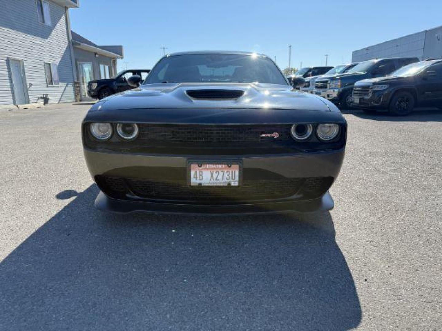 2015 Pitch Black Clearcoat /Black/Ruby Red Dodge Challenger Supercharged (2C3CDZC9XFH) with an 6.2L V8 OHV 16V SUPERCHARGED engine, 6-Speed Manual transmission, located at 1235 N Woodruff Ave., Idaho Falls, 83401, (208) 523-1053, 43.507172, -112.000488 - At Timberline Auto, finding a great deal on your next vehicle is always easy! Our experienced sales staff's goal is to help find you the right vehicle at the right price! Our knowledgeable finance department has options for almost any credit score. We offer extended service contract options to prote - Photo#6
