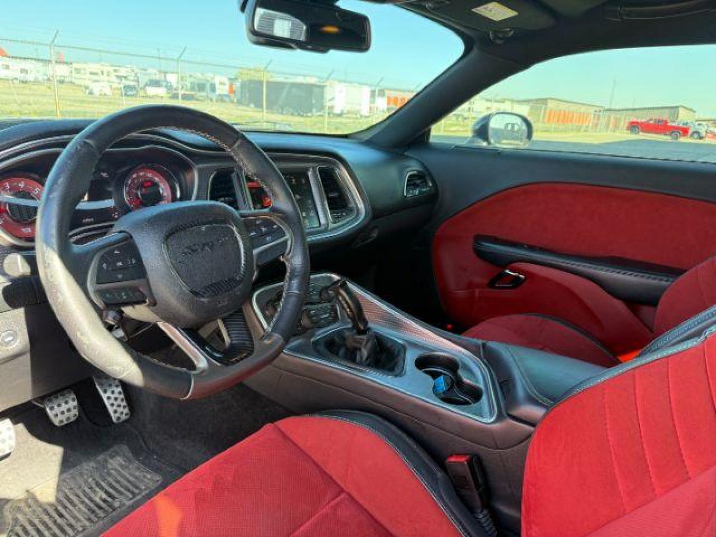 2015 Pitch Black Clearcoat /Black/Ruby Red Dodge Challenger Supercharged (2C3CDZC9XFH) with an 6.2L V8 OHV 16V SUPERCHARGED engine, 6-Speed Manual transmission, located at 1235 N Woodruff Ave., Idaho Falls, 83401, (208) 523-1053, 43.507172, -112.000488 - At Timberline Auto, finding a great deal on your next vehicle is always easy! Our experienced sales staff's goal is to help find you the right vehicle at the right price! Our knowledgeable finance department has options for almost any credit score. We offer extended service contract options to prote - Photo#9
