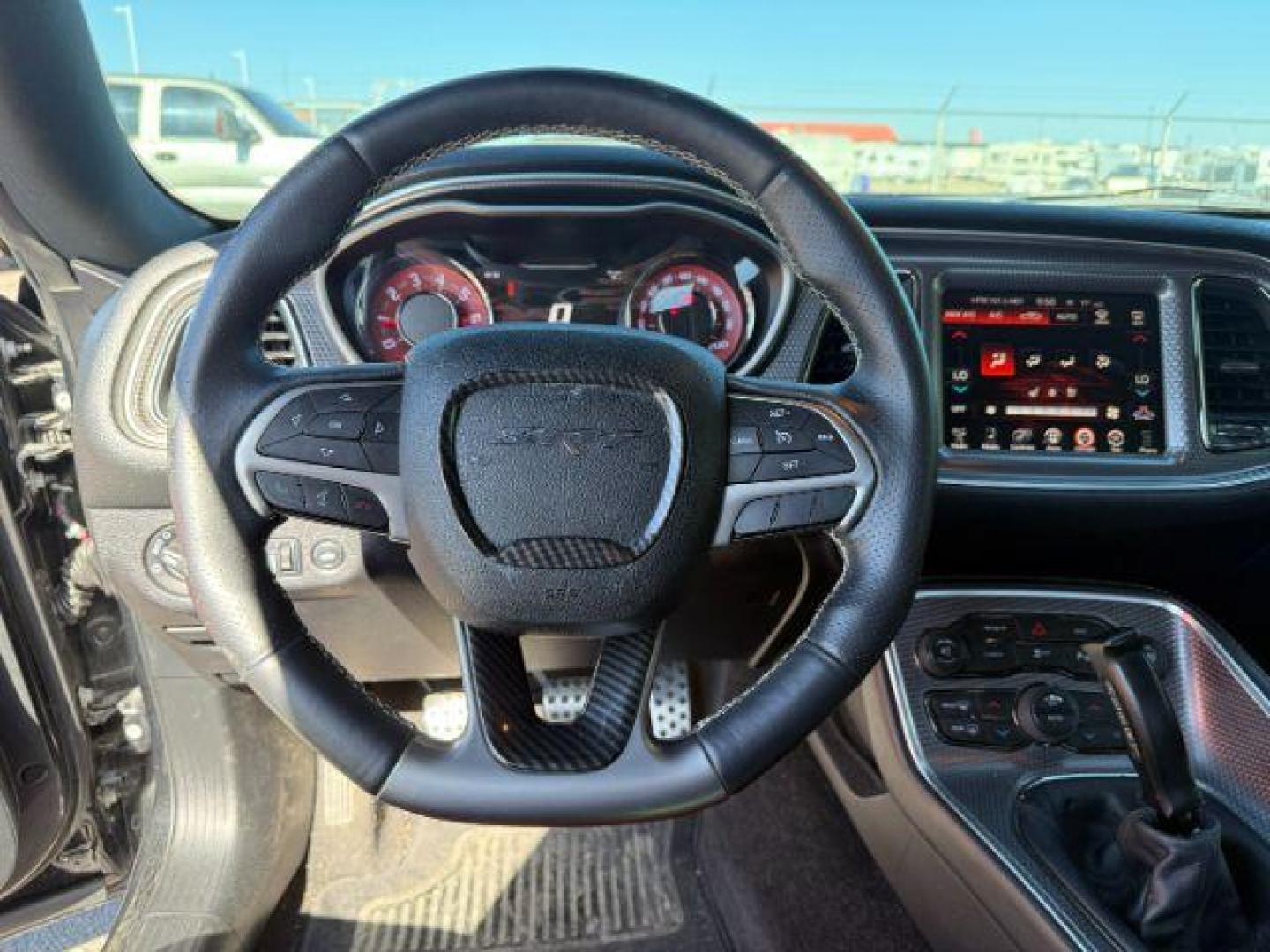 2015 Pitch Black Clearcoat /Black/Ruby Red Dodge Challenger Supercharged (2C3CDZC9XFH) with an 6.2L V8 OHV 16V SUPERCHARGED engine, 6-Speed Manual transmission, located at 1235 N Woodruff Ave., Idaho Falls, 83401, (208) 523-1053, 43.507172, -112.000488 - At Timberline Auto, finding a great deal on your next vehicle is always easy! Our experienced sales staff's goal is to help find you the right vehicle at the right price! Our knowledgeable finance department has options for almost any credit score. We offer extended service contract options to prote - Photo#10