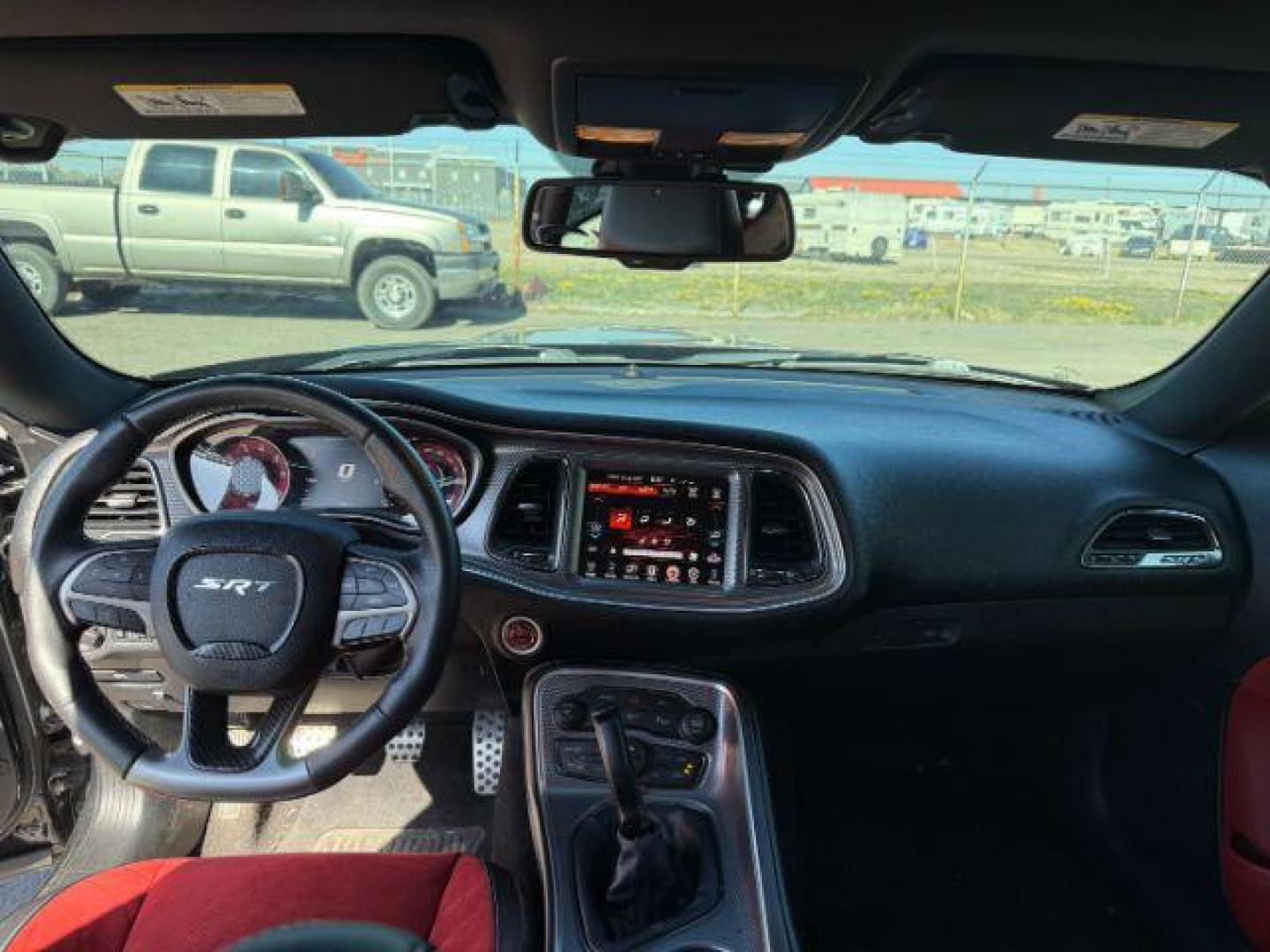 2015 Pitch Black Clearcoat /Black/Ruby Red Dodge Challenger Supercharged (2C3CDZC9XFH) with an 6.2L V8 OHV 16V SUPERCHARGED engine, 6-Speed Manual transmission, located at 1235 N Woodruff Ave., Idaho Falls, 83401, (208) 523-1053, 43.507172, -112.000488 - At Timberline Auto, finding a great deal on your next vehicle is always easy! Our experienced sales staff's goal is to help find you the right vehicle at the right price! Our knowledgeable finance department has options for almost any credit score. We offer extended service contract options to prote - Photo#17