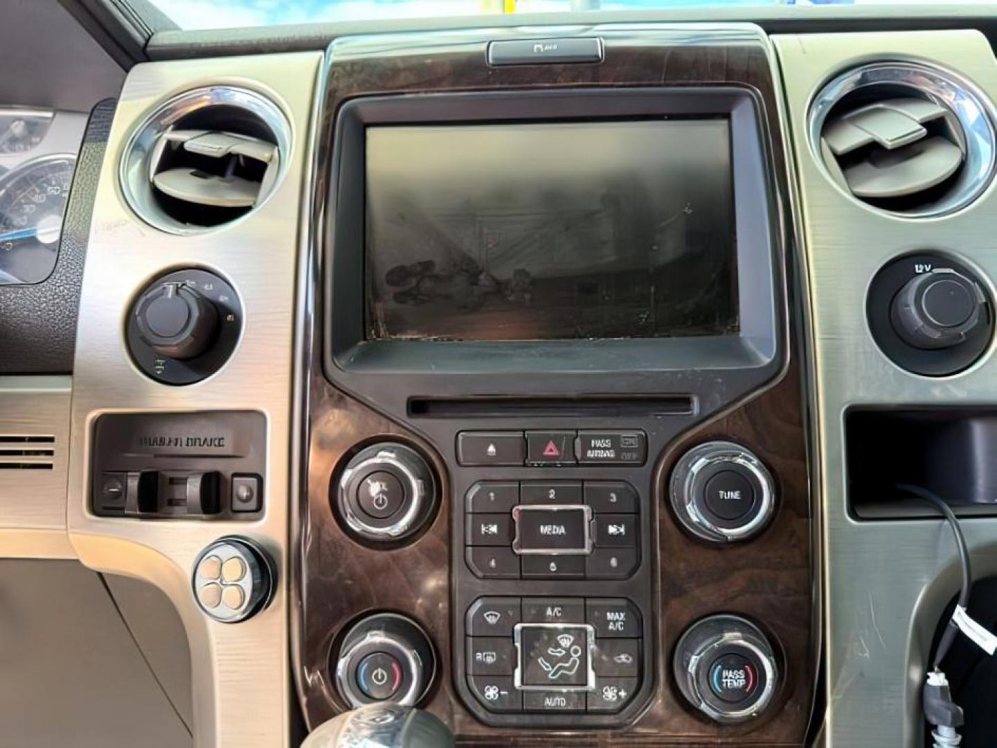 2014 BLACK /BLACK FORD F-150 PLATINUM (1FTFW1ET7EF) with an 5.3 engine, AUTO transmission, located at 1235 N Woodruff Ave., Idaho Falls, 83401, (208) 523-1053, 43.507172, -112.000488 - At Timberline Auto, finding a great deal on your next vehicle is always easy! Our experienced sales staff's goal is to help find you the right vehicle at the right price! Our knowledgeable finance department has options for almost any credit score. We offer extended service contract options to prote - Photo#12