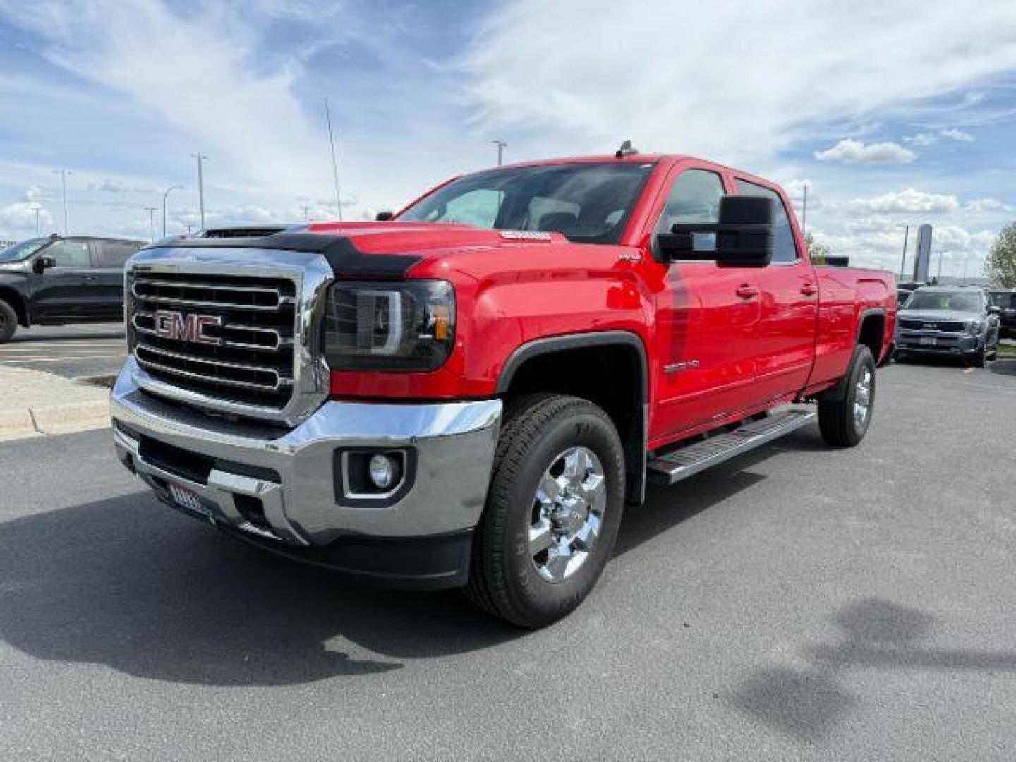 2018 Cardinal Red /Jet Black GMC Sierra 3500HD SLE (1GT42WCY2JF) with an 6.6 engine, AUTOMATIC transmission, located at 1235 N Woodruff Ave., Idaho Falls, 83401, (208) 523-1053, 43.507172, -112.000488 - At Timberline Auto, finding a great deal on your next vehicle is always easy! Our experienced sales staff's goal is to help find you the right vehicle at the right price! Our knowledgeable finance department has options for almost any credit score. We offer extended service contract options to prote - Photo#0