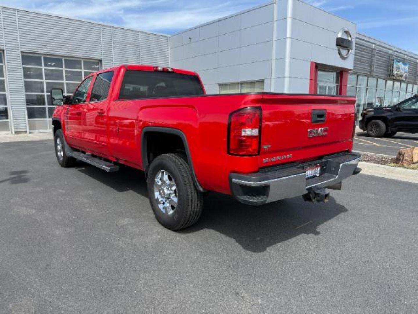 2018 Cardinal Red /Jet Black GMC Sierra 3500HD SLE (1GT42WCY2JF) with an 6.6 engine, AUTOMATIC transmission, located at 1235 N Woodruff Ave., Idaho Falls, 83401, (208) 523-1053, 43.507172, -112.000488 - At Timberline Auto, finding a great deal on your next vehicle is always easy! Our experienced sales staff's goal is to help find you the right vehicle at the right price! Our knowledgeable finance department has options for almost any credit score. We offer extended service contract options to prote - Photo#2