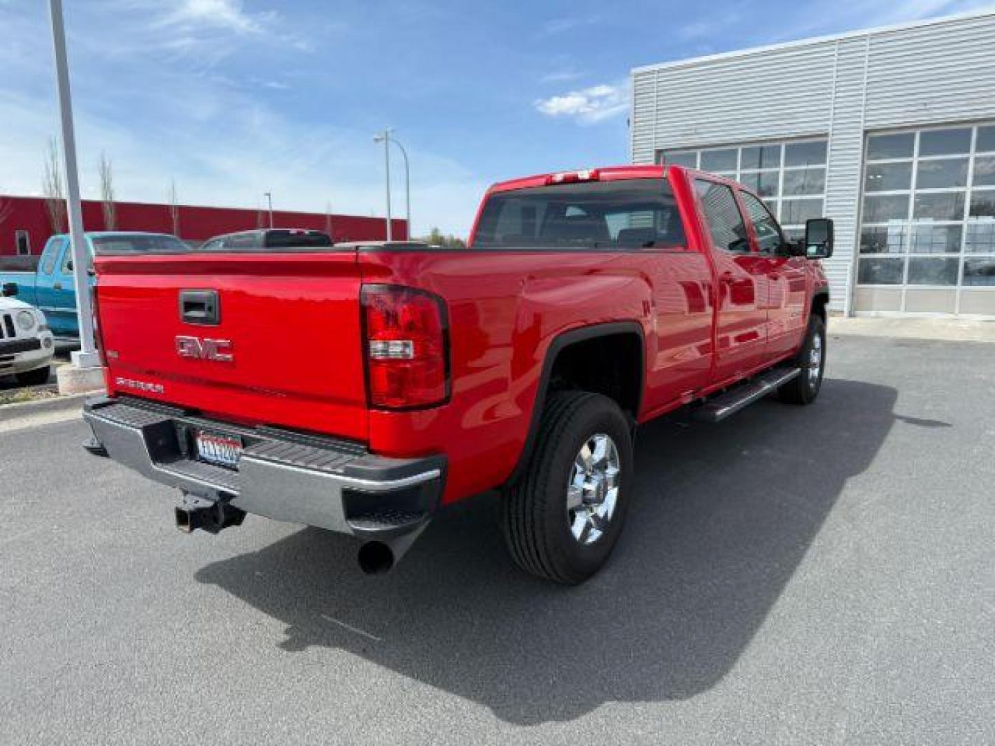 2018 Cardinal Red /Jet Black GMC Sierra 3500HD SLE (1GT42WCY2JF) with an 6.6 engine, AUTOMATIC transmission, located at 1235 N Woodruff Ave., Idaho Falls, 83401, (208) 523-1053, 43.507172, -112.000488 - At Timberline Auto, finding a great deal on your next vehicle is always easy! Our experienced sales staff's goal is to help find you the right vehicle at the right price! Our knowledgeable finance department has options for almost any credit score. We offer extended service contract options to prote - Photo#6