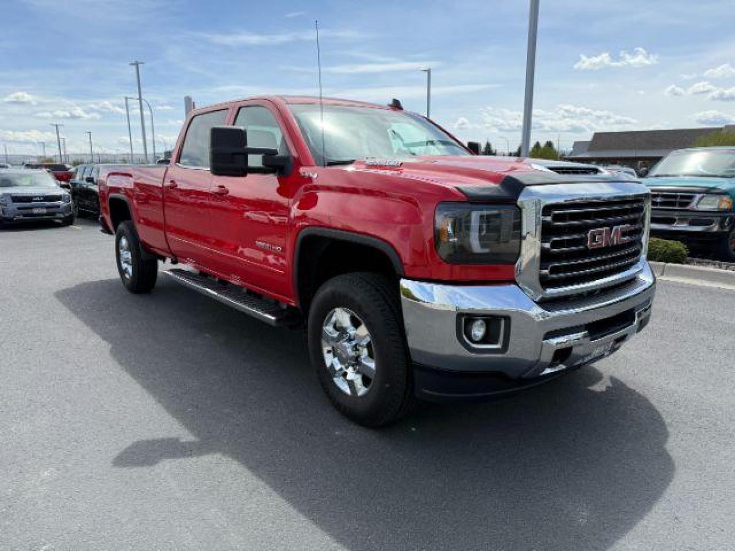 2018 Cardinal Red /Jet Black GMC Sierra 3500HD SLE (1GT42WCY2JF) with an 6.6 engine, AUTOMATIC transmission, located at 1235 N Woodruff Ave., Idaho Falls, 83401, (208) 523-1053, 43.507172, -112.000488 - At Timberline Auto, finding a great deal on your next vehicle is always easy! Our experienced sales staff's goal is to help find you the right vehicle at the right price! Our knowledgeable finance department has options for almost any credit score. We offer extended service contract options to prote - Photo#8