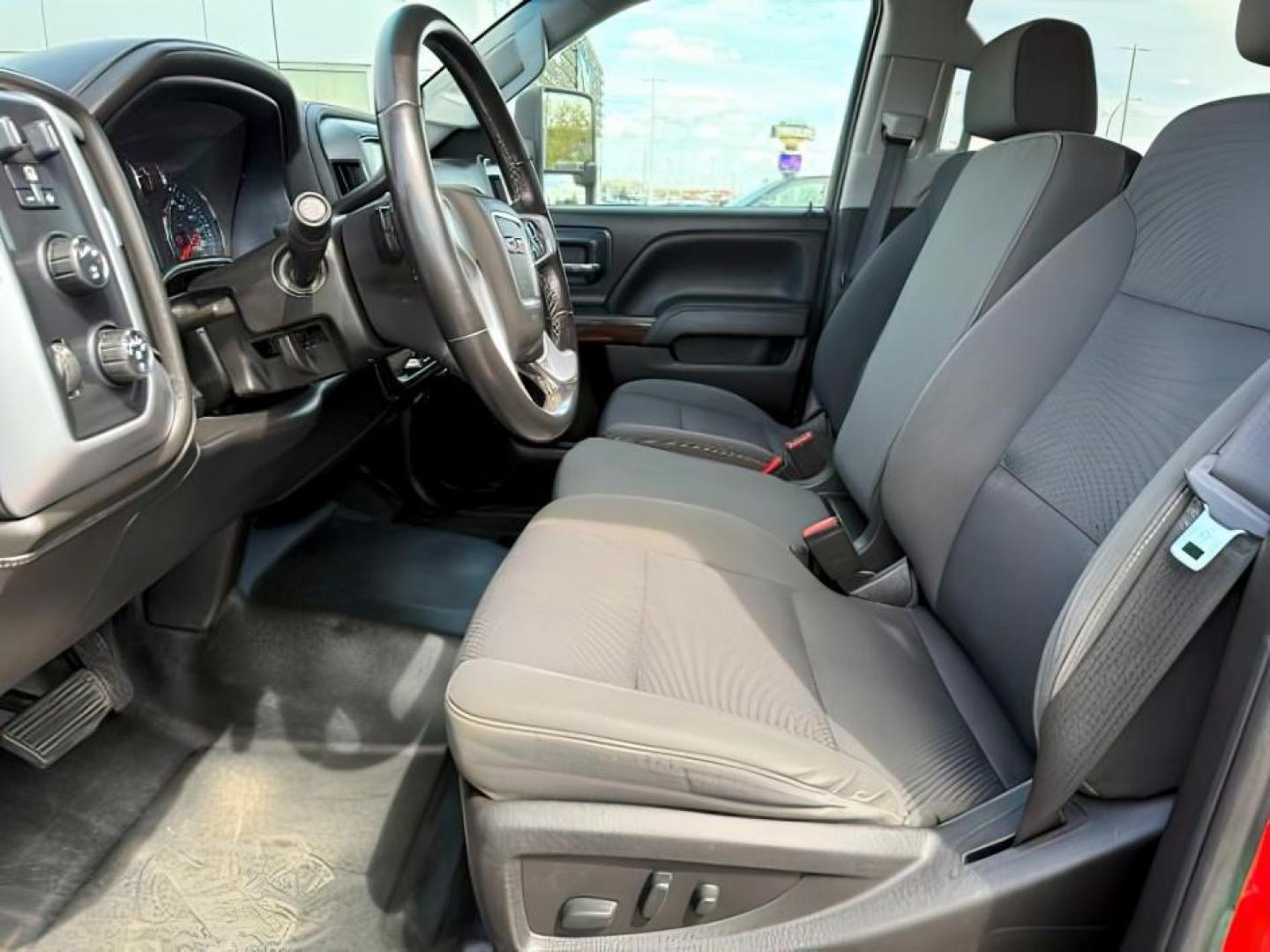 2018 Cardinal Red /Jet Black GMC Sierra 3500HD SLE (1GT42WCY2JF) with an 6.6 engine, AUTOMATIC transmission, located at 1235 N Woodruff Ave., Idaho Falls, 83401, (208) 523-1053, 43.507172, -112.000488 - At Timberline Auto, finding a great deal on your next vehicle is always easy! Our experienced sales staff's goal is to help find you the right vehicle at the right price! Our knowledgeable finance department has options for almost any credit score. We offer extended service contract options to prote - Photo#11