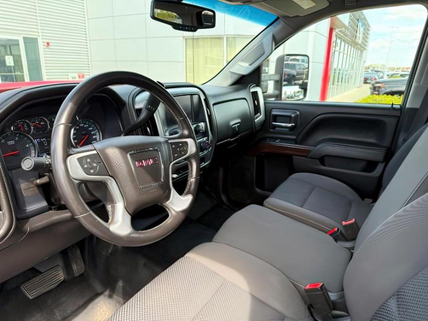 2018 Cardinal Red /Jet Black GMC Sierra 3500HD SLE (1GT42WCY2JF) with an 6.6 engine, AUTOMATIC transmission, located at 1235 N Woodruff Ave., Idaho Falls, 83401, (208) 523-1053, 43.507172, -112.000488 - At Timberline Auto, finding a great deal on your next vehicle is always easy! Our experienced sales staff's goal is to help find you the right vehicle at the right price! Our knowledgeable finance department has options for almost any credit score. We offer extended service contract options to prote - Photo#12