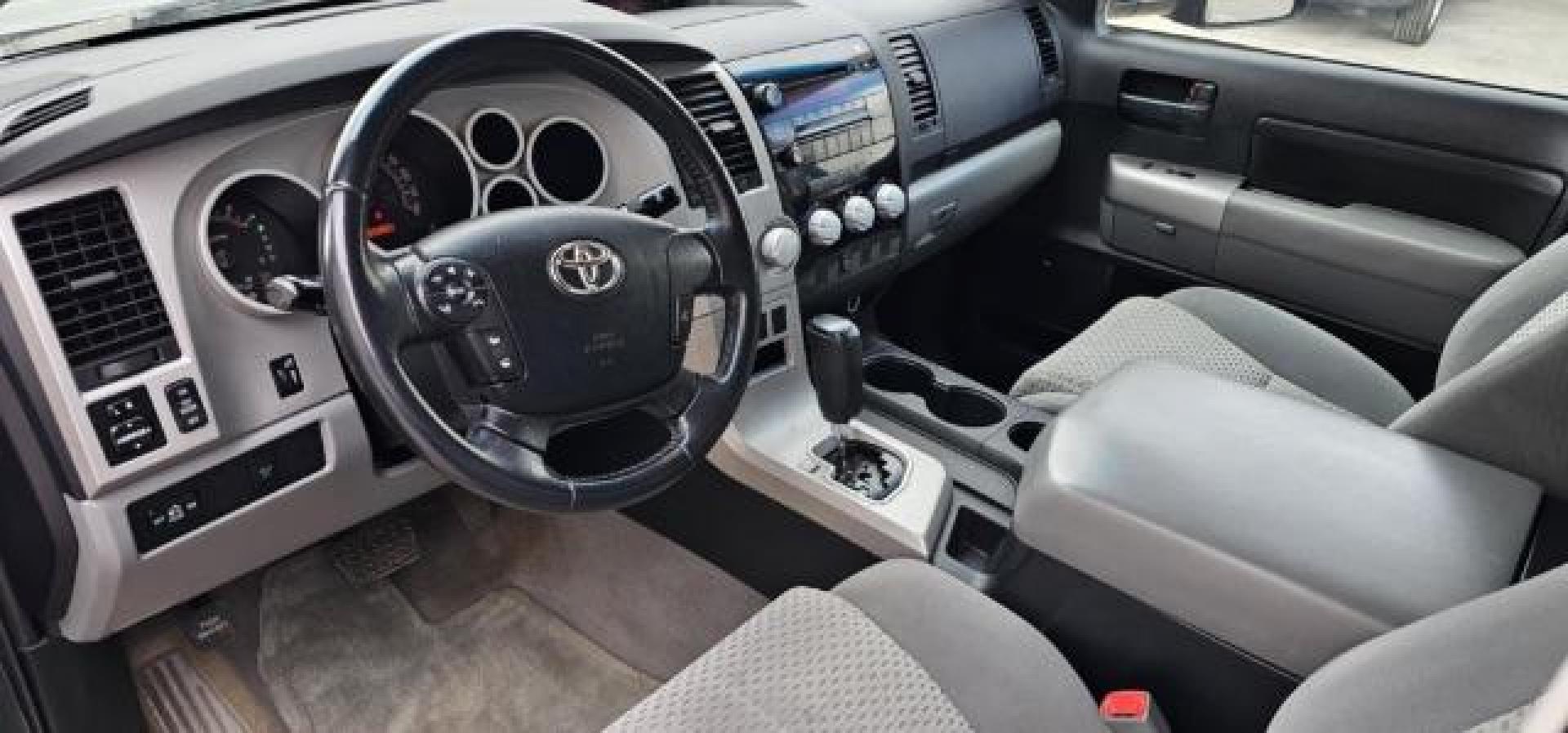 2008 GREEN /Sand Beige Toyota Tundra Base 5.7L V8 | SR5 5.7L V8 (5TFBV541X8X) with an I-FORCE 5.7L V-8 DOHC engine, AUTOMATIC transmission, located at 1235 N Woodruff Ave., Idaho Falls, 83401, (208) 523-1053, 43.507172, -112.000488 - At Timberline Auto, finding a great deal on your next vehicle is always easy! Our experienced sales staff's goal is to help find you the right vehicle at the right price! Our knowledgeable finance department has options for almost any credit score. We offer extended service contract options to prote - Photo#10