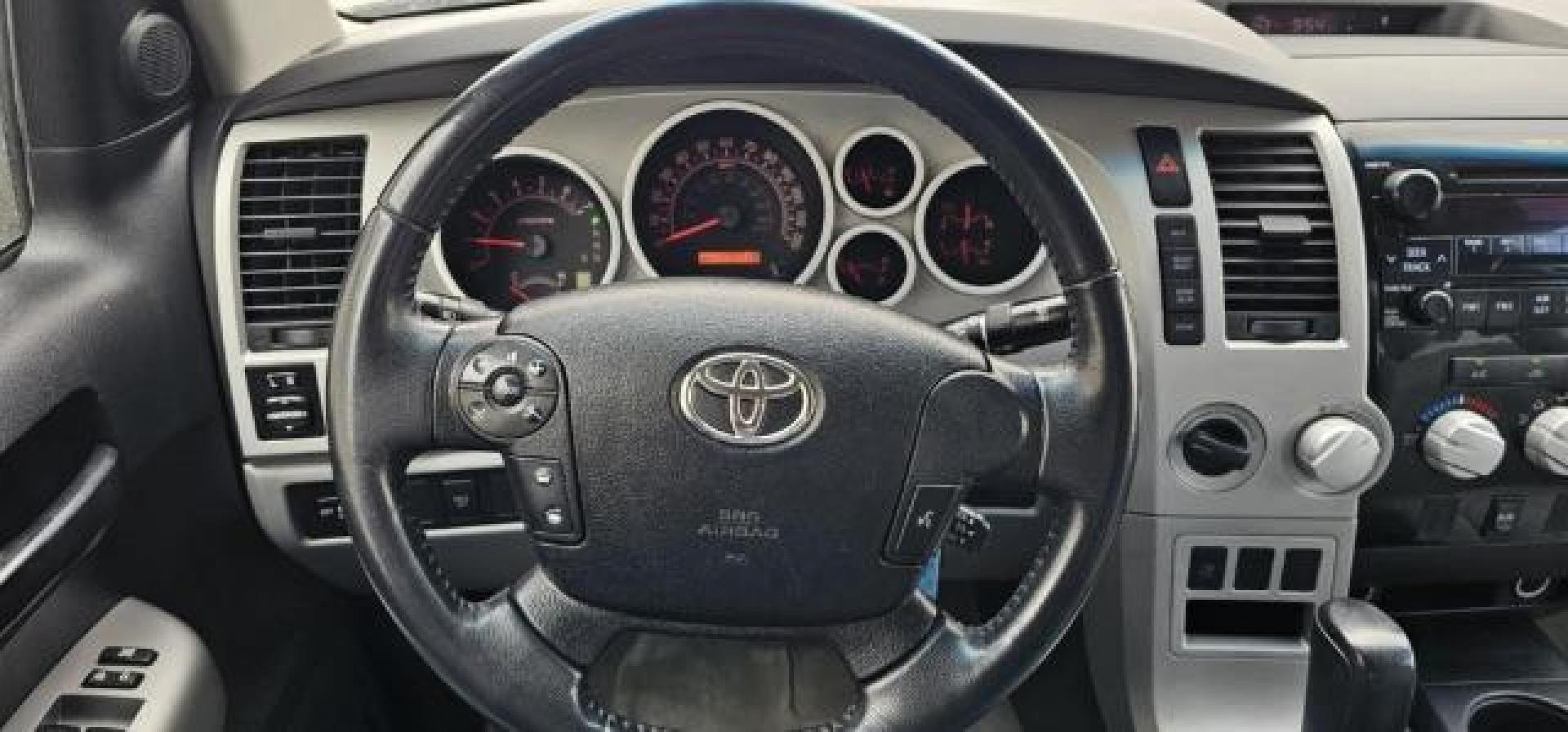 2008 GREEN /Sand Beige Toyota Tundra Base 5.7L V8 | SR5 5.7L V8 (5TFBV541X8X) with an I-FORCE 5.7L V-8 DOHC engine, AUTOMATIC transmission, located at 1235 N Woodruff Ave., Idaho Falls, 83401, (208) 523-1053, 43.507172, -112.000488 - At Timberline Auto, finding a great deal on your next vehicle is always easy! Our experienced sales staff's goal is to help find you the right vehicle at the right price! Our knowledgeable finance department has options for almost any credit score. We offer extended service contract options to prote - Photo#13
