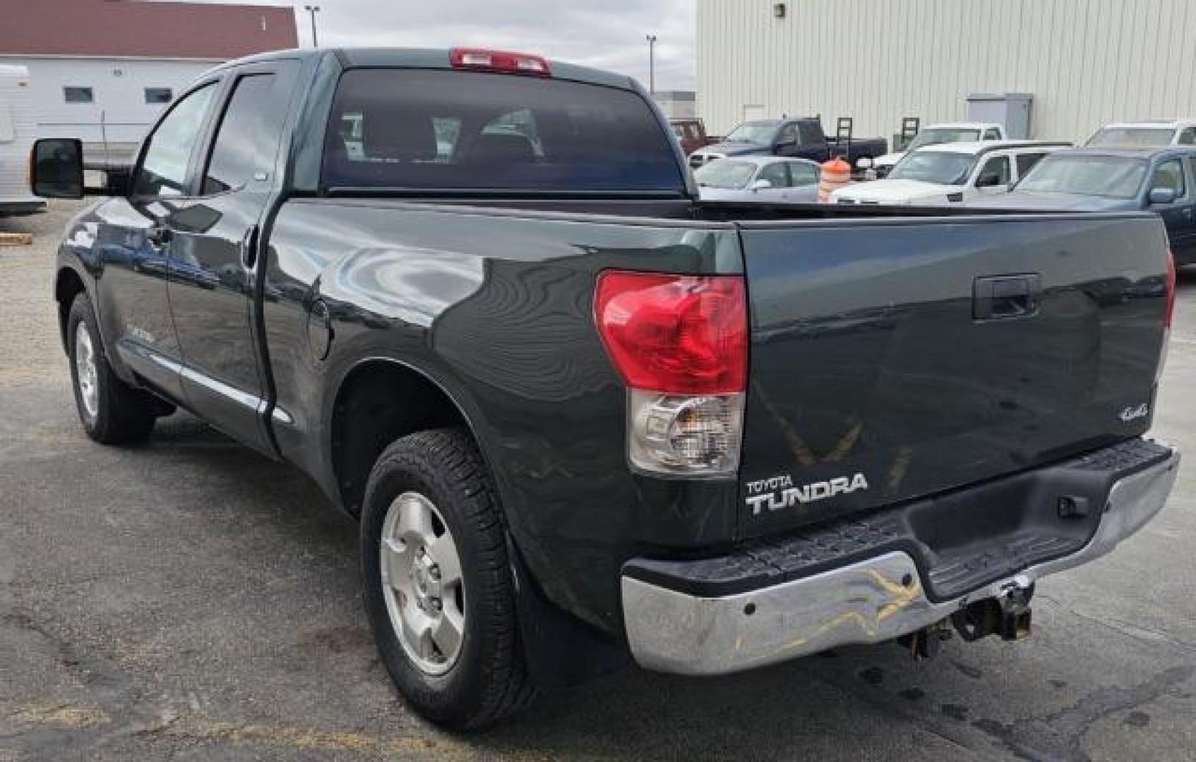 2008 GREEN /Sand Beige Toyota Tundra Base 5.7L V8 | SR5 5.7L V8 (5TFBV541X8X) with an I-FORCE 5.7L V-8 DOHC engine, AUTOMATIC transmission, located at 1235 N Woodruff Ave., Idaho Falls, 83401, (208) 523-1053, 43.507172, -112.000488 - At Timberline Auto, finding a great deal on your next vehicle is always easy! Our experienced sales staff's goal is to help find you the right vehicle at the right price! Our knowledgeable finance department has options for almost any credit score. We offer extended service contract options to prote - Photo#2