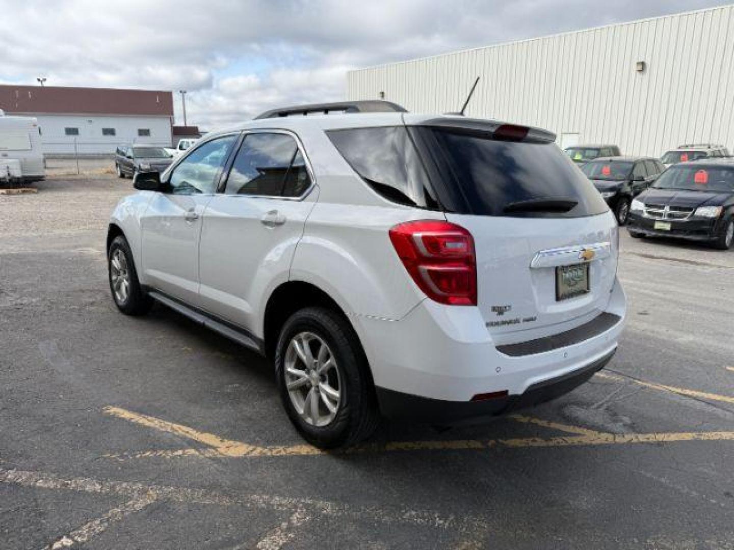 2017 Summit White /Jet Black Chevrolet Equinox LT (2GNFLFEK2H6) with an 2.4L I-4 gasoline direct injection engine, located at 1235 N Woodruff Ave., Idaho Falls, 83401, (208) 523-1053, 43.507172, -112.000488 - At Timberline Auto, finding a great deal on your next vehicle is always easy! Our experienced sales staff's goal is to help find you the right vehicle at the right price! Our knowledgeable finance department has options for almost any credit score. We offer extended service contract options to prote - Photo#1