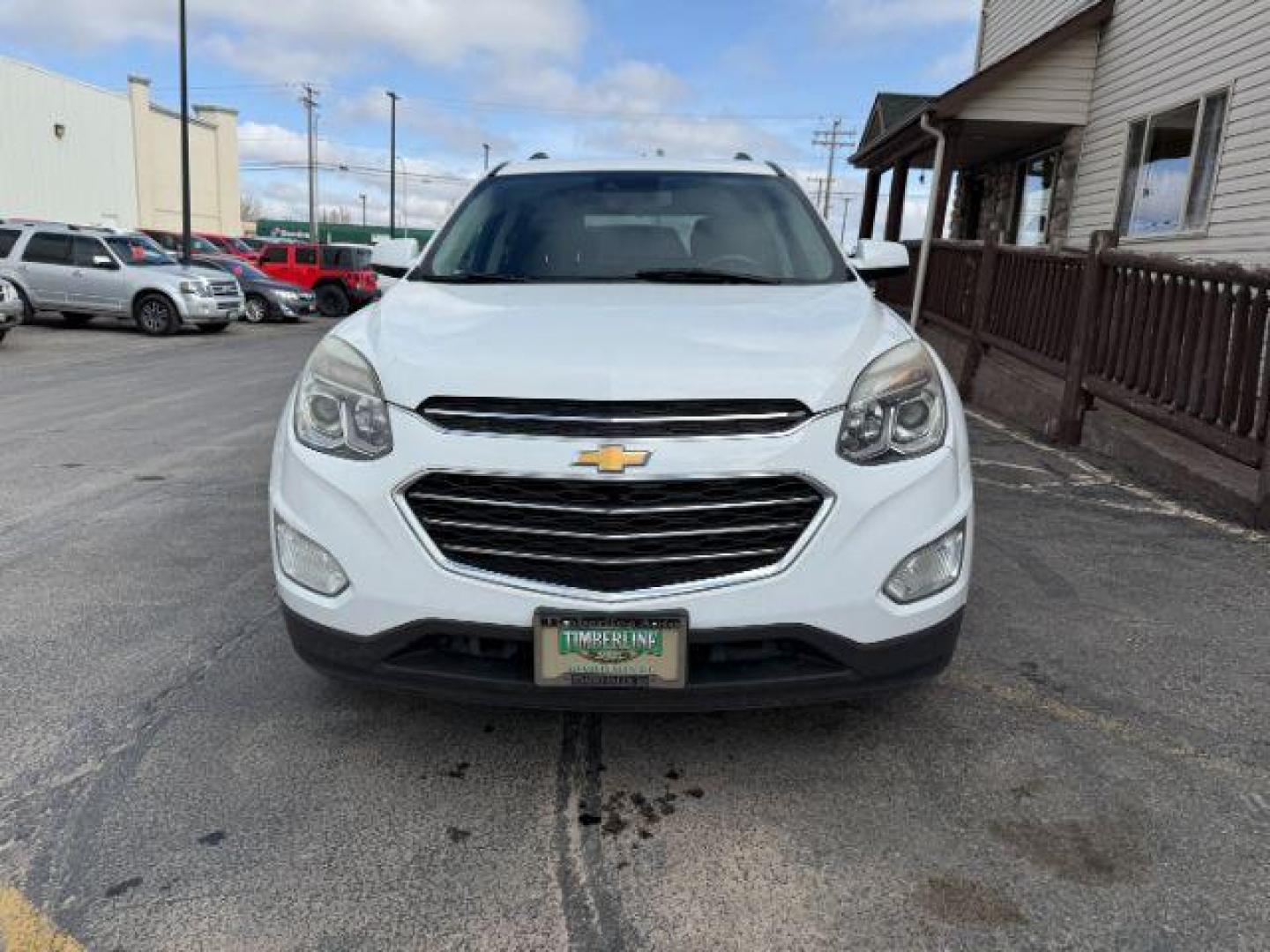 2017 Summit White /Jet Black Chevrolet Equinox LT (2GNFLFEK2H6) with an 2.4L I-4 gasoline direct injection engine, located at 1235 N Woodruff Ave., Idaho Falls, 83401, (208) 523-1053, 43.507172, -112.000488 - At Timberline Auto, finding a great deal on your next vehicle is always easy! Our experienced sales staff's goal is to help find you the right vehicle at the right price! Our knowledgeable finance department has options for almost any credit score. We offer extended service contract options to prote - Photo#7