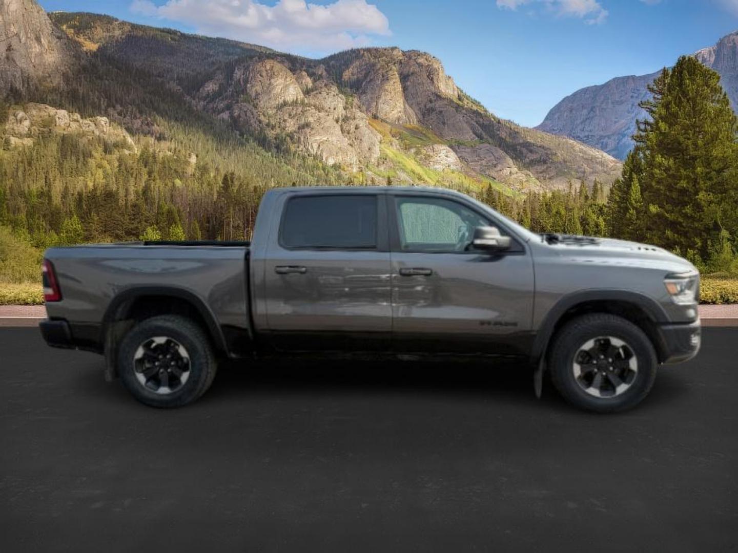 2020 GRAY /LEATHER Ram 1500 (1C6SRFLT8LN) with an 57 engine, Automatic transmission, located at 1175 N Woodruff Ave, Idaho Falls, ID, 83401, 43.506901, -111.999657 - At Timberline Auto, finding a great deal on your next vehicle is always easy! Our experienced sales staff's goal is to help find you the right vehicle at the right price! Our knowledgeable finance department has options for almost any credit score. We offer extended service contract options to prote - Photo#6
