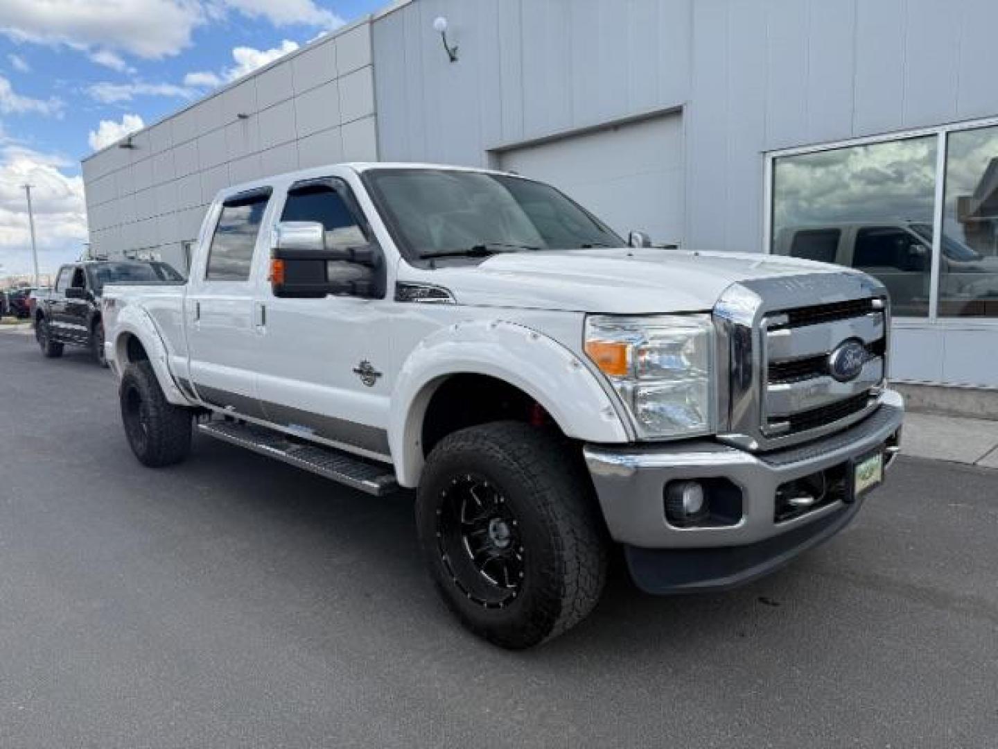2014 White Platinum Metallic Tri-Coat /Black Ford F-350 LARIAT (1FT8W3BT4EE) with an 6.7 engine, AUTOMATIC transmission, located at 1235 N Woodruff Ave., Idaho Falls, 83401, (208) 523-1053, 43.507172, -112.000488 - At Timberline Auto, finding a great deal on your next vehicle is always easy! Our experienced sales staff's goal is to help find you the right vehicle at the right price! Our knowledgeable finance department has options for almost any credit score. We offer extended service contract options to prote - Photo#3