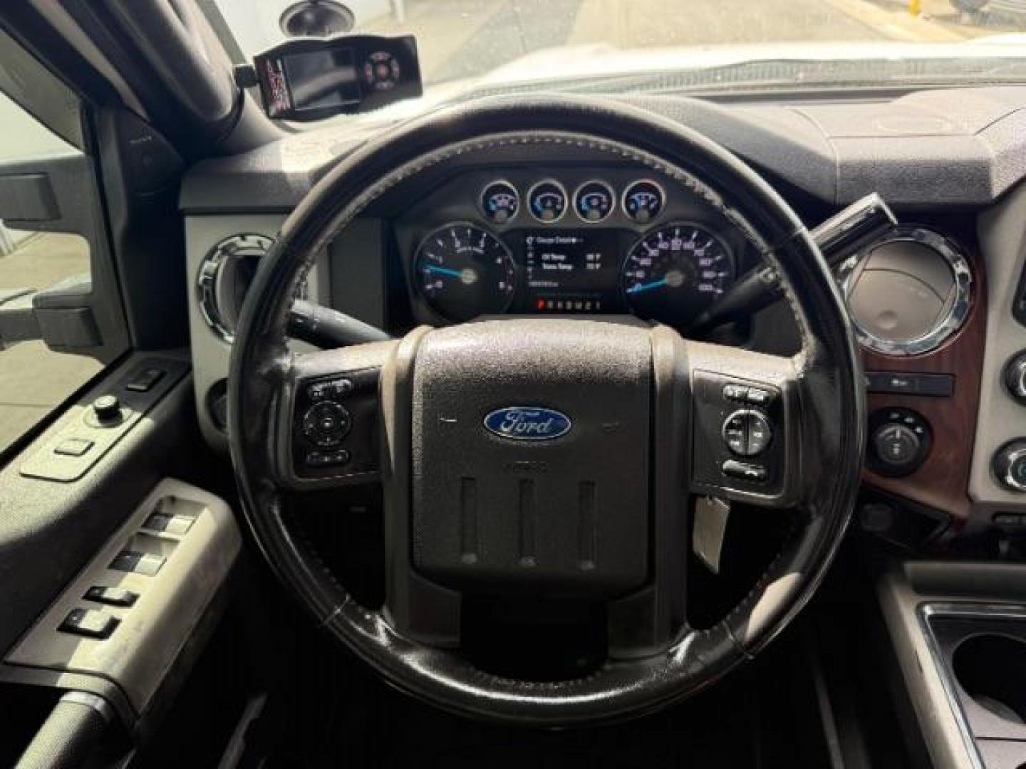 2014 White Platinum Metallic Tri-Coat /Black Ford F-350 LARIAT (1FT8W3BT4EE) with an 6.7 engine, AUTOMATIC transmission, located at 1235 N Woodruff Ave., Idaho Falls, 83401, (208) 523-1053, 43.507172, -112.000488 - At Timberline Auto, finding a great deal on your next vehicle is always easy! Our experienced sales staff's goal is to help find you the right vehicle at the right price! Our knowledgeable finance department has options for almost any credit score. We offer extended service contract options to prote - Photo#24