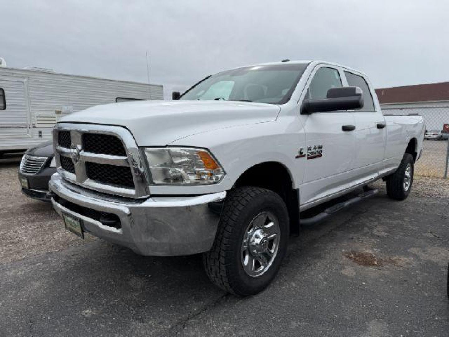 2016 Bright White Clearcoat Ram 2500 Tradesman (3C6UR5HL7GG) with an Cummins 6.7L I-6 diesel direct injection engine, AUTOMATIC transmission, located at 1235 N Woodruff Ave., Idaho Falls, 83401, (208) 523-1053, 43.507172, -112.000488 - At Timberline Auto, finding a great deal on your next vehicle is always easy! Our experienced sales staff's goal is to help find you the right vehicle at the right price! Our knowledgeable finance department has options for almost any credit score. We offer extended service contract options to prote - Photo#0