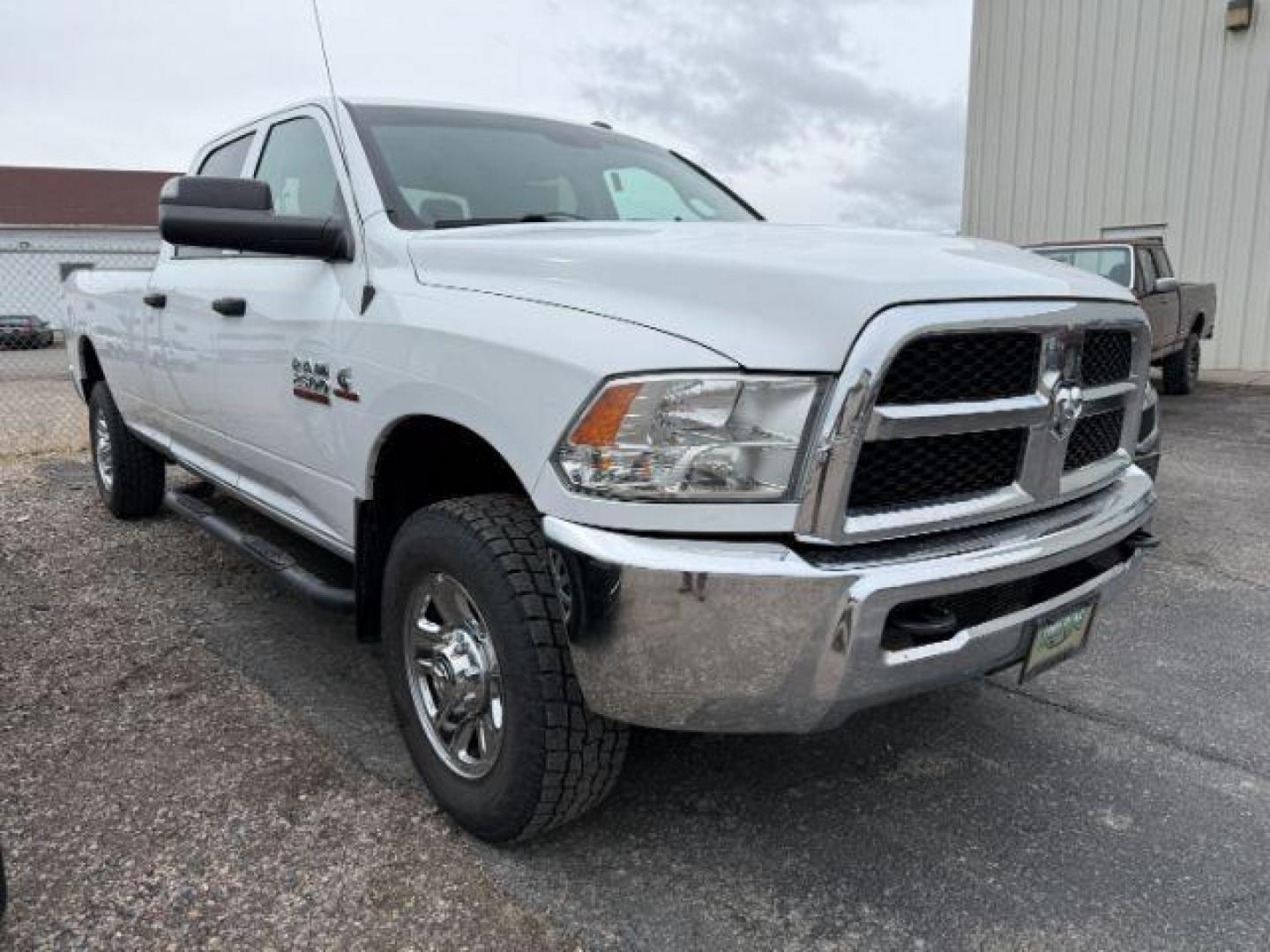 2016 Bright White Clearcoat Ram 2500 Tradesman (3C6UR5HL7GG) with an Cummins 6.7L I-6 diesel direct injection engine, AUTOMATIC transmission, located at 1235 N Woodruff Ave., Idaho Falls, 83401, (208) 523-1053, 43.507172, -112.000488 - At Timberline Auto, finding a great deal on your next vehicle is always easy! Our experienced sales staff's goal is to help find you the right vehicle at the right price! Our knowledgeable finance department has options for almost any credit score. We offer extended service contract options to prote - Photo#4