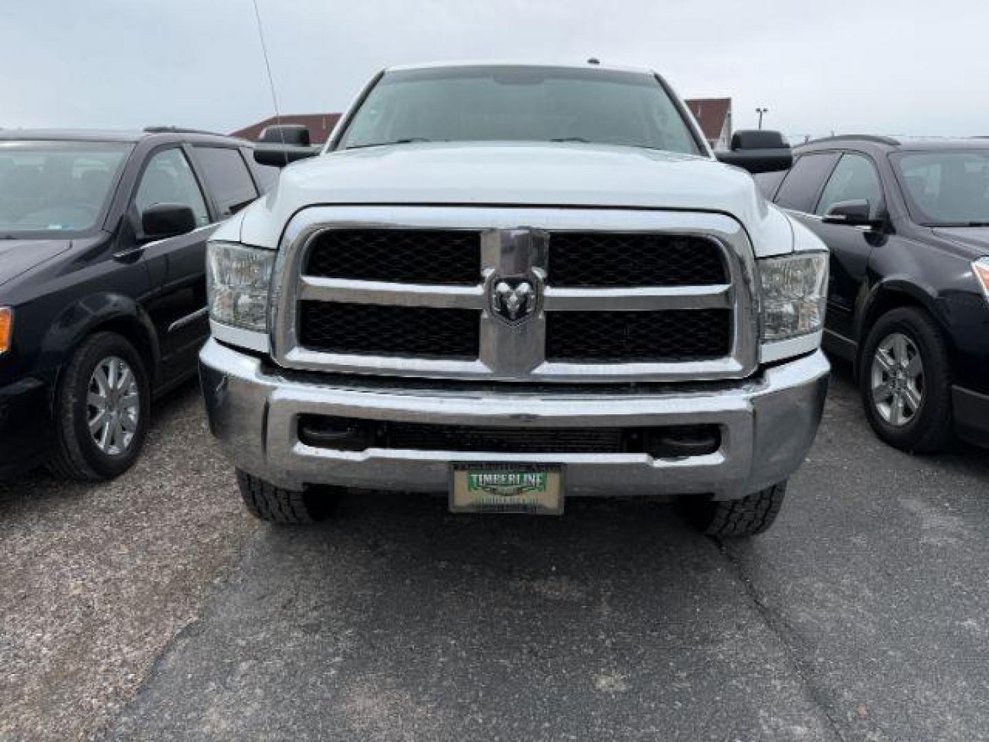 2016 Bright White Clearcoat Ram 2500 Tradesman (3C6UR5HL7GG) with an Cummins 6.7L I-6 diesel direct injection engine, AUTOMATIC transmission, located at 1235 N Woodruff Ave., Idaho Falls, 83401, (208) 523-1053, 43.507172, -112.000488 - At Timberline Auto, finding a great deal on your next vehicle is always easy! Our experienced sales staff's goal is to help find you the right vehicle at the right price! Our knowledgeable finance department has options for almost any credit score. We offer extended service contract options to prote - Photo#5