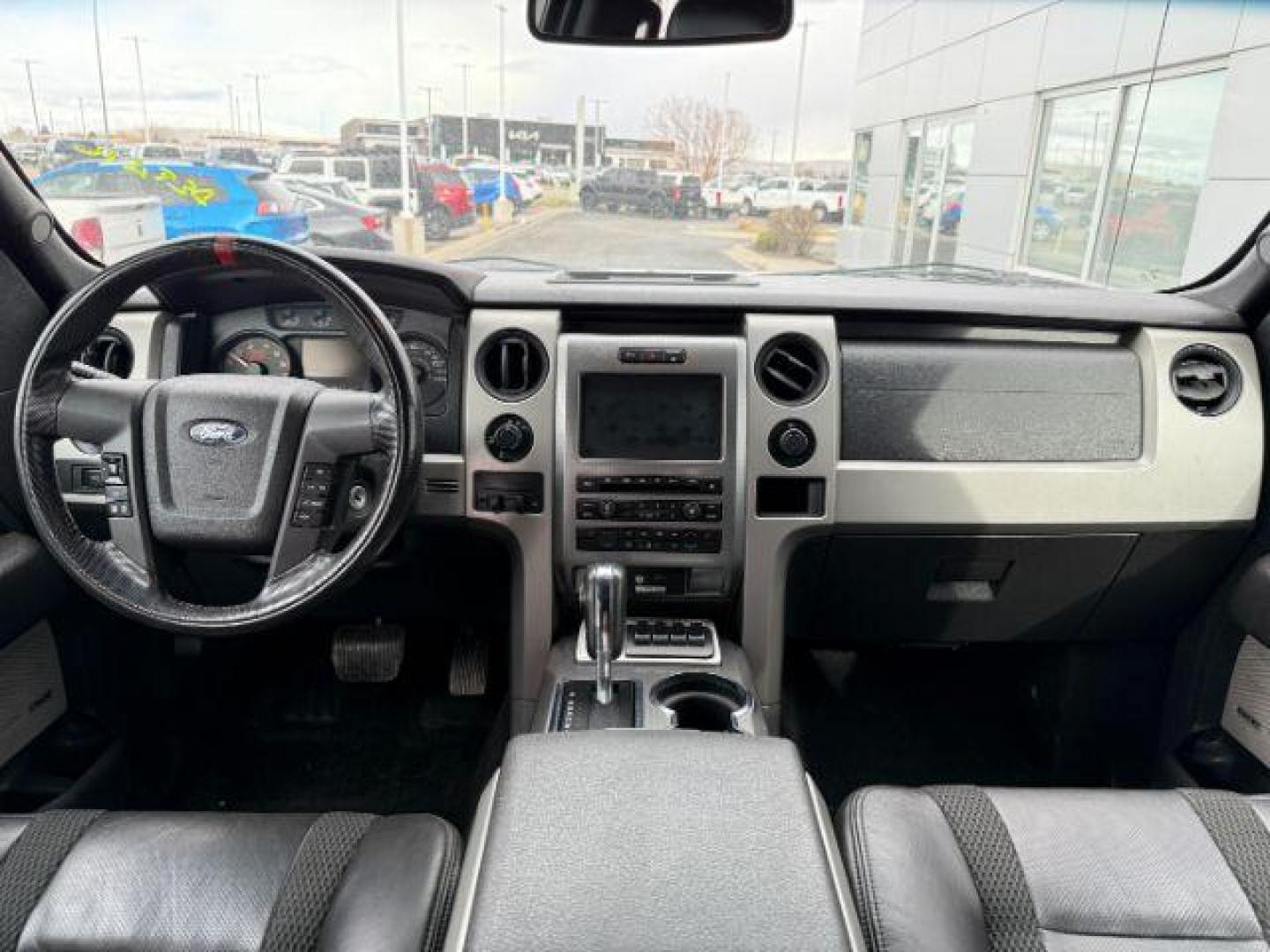 2011 Oxford White /Black Ford F-150 SVT Raptor (1FTFW1R68BF) with an Triton 6.2L V-8 variable valve control engine, AUTOMATIC transmission, located at 1235 N Woodruff Ave., Idaho Falls, 83401, (208) 523-1053, 43.507172, -112.000488 - Photo#17