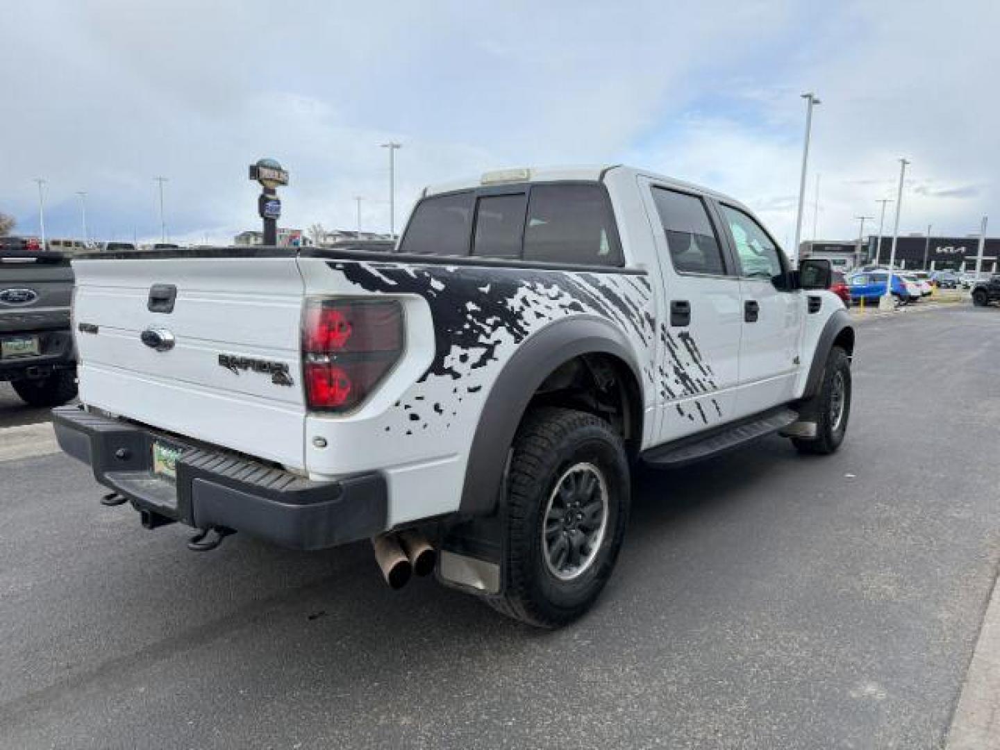 2011 Oxford White /Black Ford F-150 SVT Raptor (1FTFW1R68BF) with an Triton 6.2L V-8 variable valve control engine, AUTOMATIC transmission, located at 1235 N Woodruff Ave., Idaho Falls, 83401, (208) 523-1053, 43.507172, -112.000488 - Photo#4