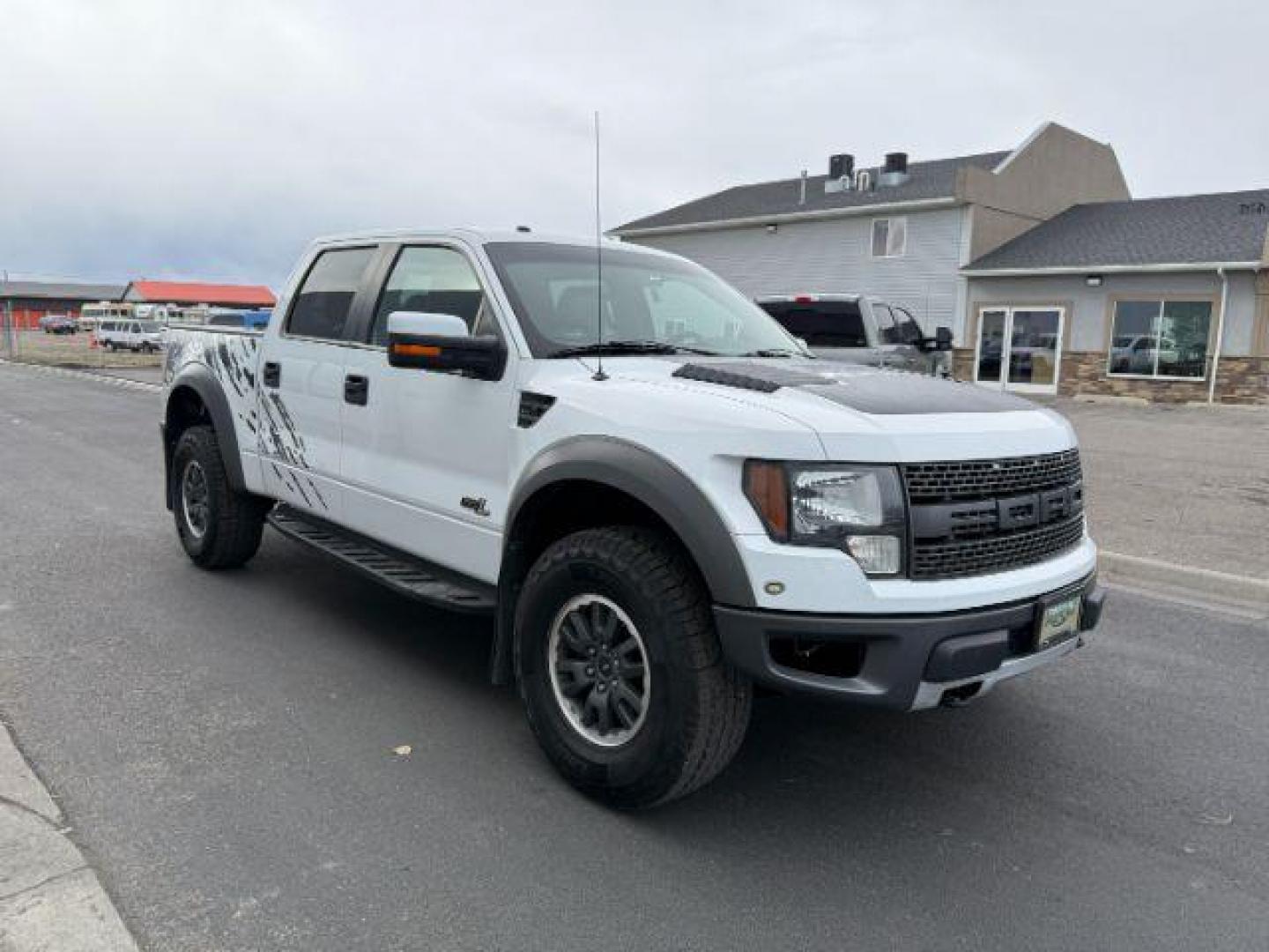 2011 Oxford White /Black Ford F-150 SVT Raptor (1FTFW1R68BF) with an Triton 6.2L V-8 variable valve control engine, AUTOMATIC transmission, located at 1235 N Woodruff Ave., Idaho Falls, 83401, (208) 523-1053, 43.507172, -112.000488 - Photo#5