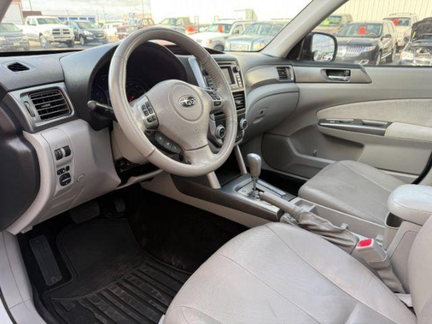 2012 Satin White Pearl /Black Leather Interior Subaru Forester 2.5X Touring (JF2SHAGC0CH) with an 2.5L H4 SOHC 16V engine, 4-Speed Automatic transmission, located at 1235 N Woodruff Ave., Idaho Falls, 83401, (208) 523-1053, 43.507172, -112.000488 - Photo#9