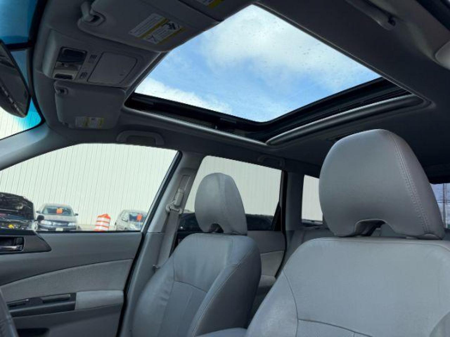 2012 Satin White Pearl /Black Leather Interior Subaru Forester 2.5X Touring (JF2SHAGC0CH) with an 2.5L H4 SOHC 16V engine, 4-Speed Automatic transmission, located at 1235 N Woodruff Ave., Idaho Falls, 83401, (208) 523-1053, 43.507172, -112.000488 - Photo#13