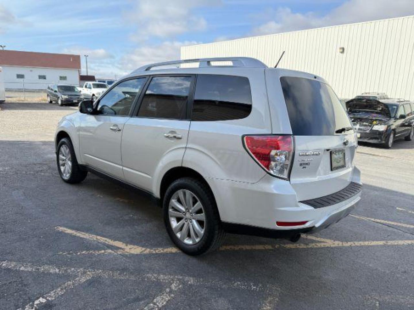 2012 Satin White Pearl /Black Leather Interior Subaru Forester 2.5X Touring (JF2SHAGC0CH) with an 2.5L H4 SOHC 16V engine, 4-Speed Automatic transmission, located at 1235 N Woodruff Ave., Idaho Falls, 83401, (208) 523-1053, 43.507172, -112.000488 - Photo#1