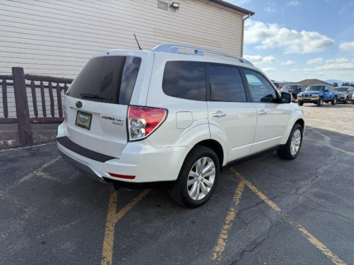 2012 Satin White Pearl /Black Leather Interior Subaru Forester 2.5X Touring (JF2SHAGC0CH) with an 2.5L H4 SOHC 16V engine, 4-Speed Automatic transmission, located at 1235 N Woodruff Ave., Idaho Falls, 83401, (208) 523-1053, 43.507172, -112.000488 - Photo#3