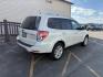 2012 Satin White Pearl /Black Leather Interior Subaru Forester 2.5X Touring (JF2SHAGC0CH) with an 2.5L H4 SOHC 16V engine, 4-Speed Automatic transmission, located at 1235 N Woodruff Ave., Idaho Falls, 83401, (208) 523-1053, 43.507172, -112.000488 - Photo#3