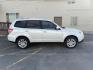 2012 Satin White Pearl /Black Leather Interior Subaru Forester 2.5X Touring (JF2SHAGC0CH) with an 2.5L H4 SOHC 16V engine, 4-Speed Automatic transmission, located at 1235 N Woodruff Ave., Idaho Falls, 83401, (208) 523-1053, 43.507172, -112.000488 - Photo#4